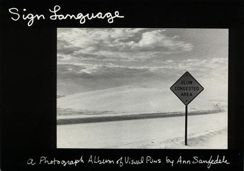 Sign Language: A Photograph Album Of Visual Puns,Used