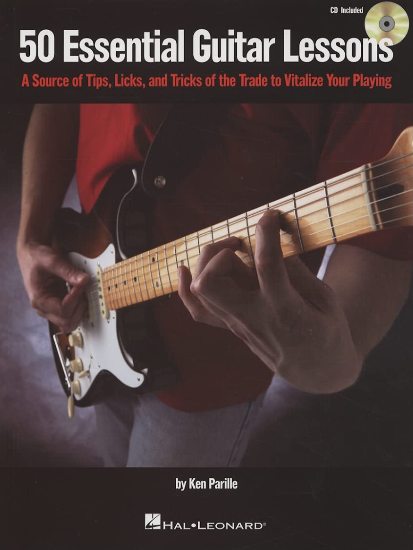 50 Essential Guitar Lessons: A Source of Tips, Licks, and Tricks of the Trade to Vitalize Your Playing,Used