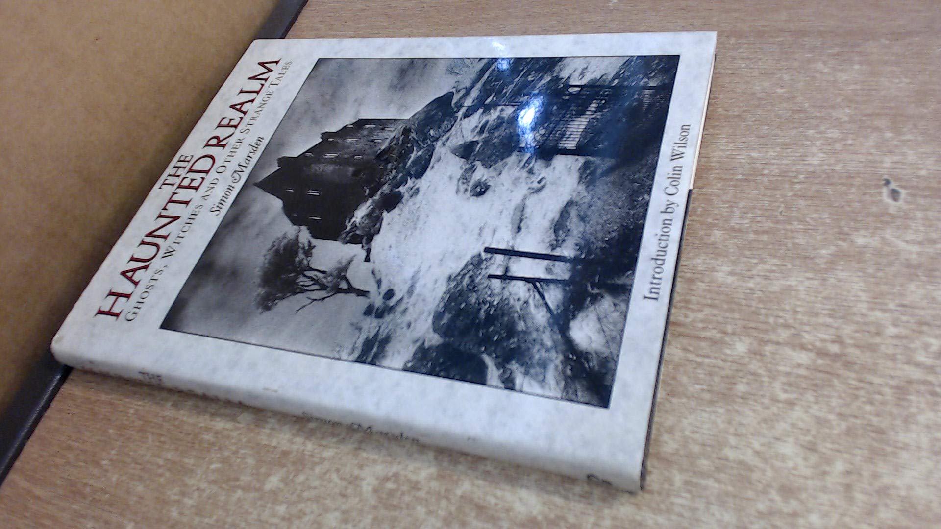 The Haunted Realm: Ghosts, Spirits, and Their Uncanny Abodes,Used