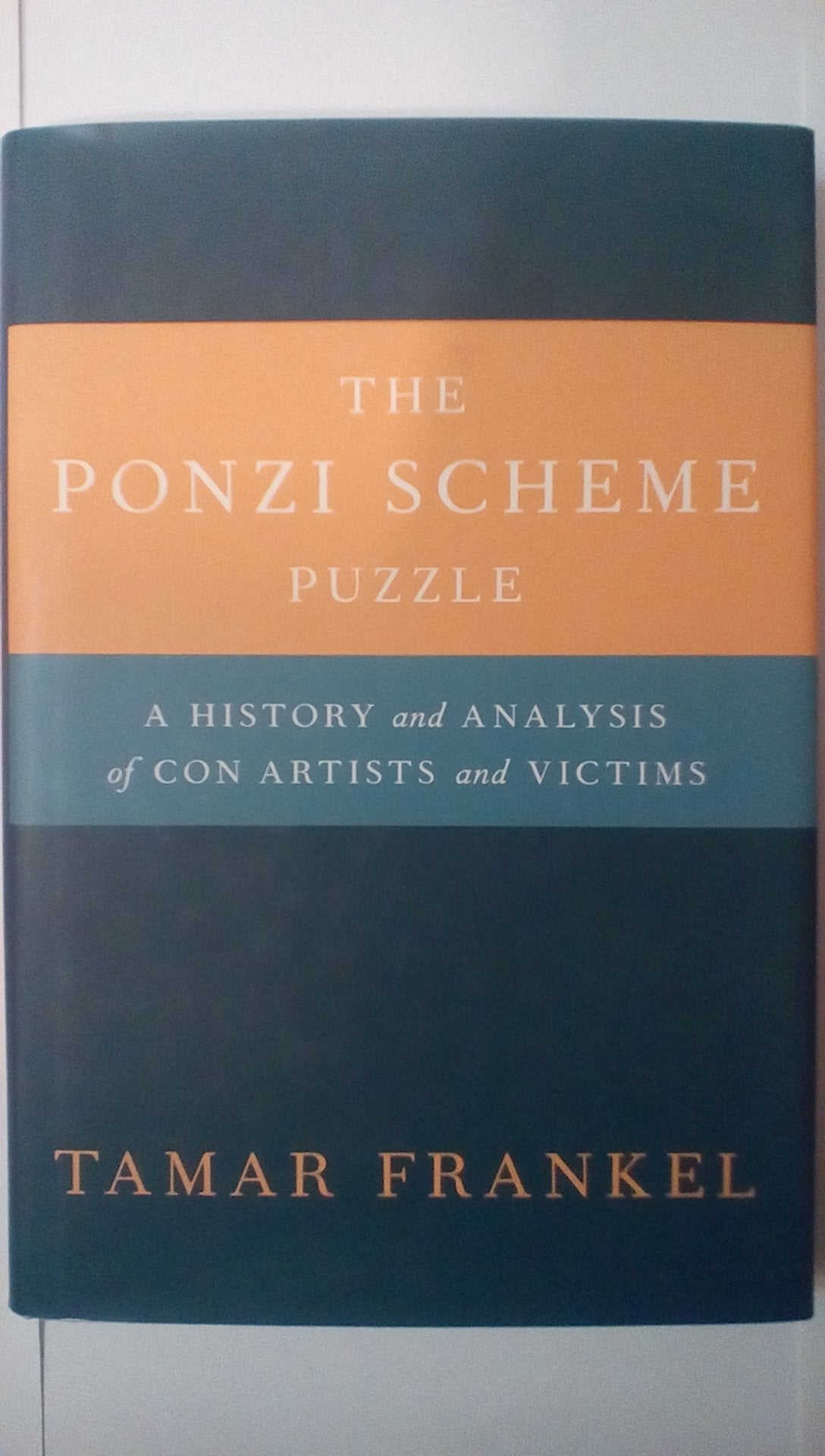The Ponzi Scheme Puzzle: A History And Analysis Of Con Artists And Victims,New