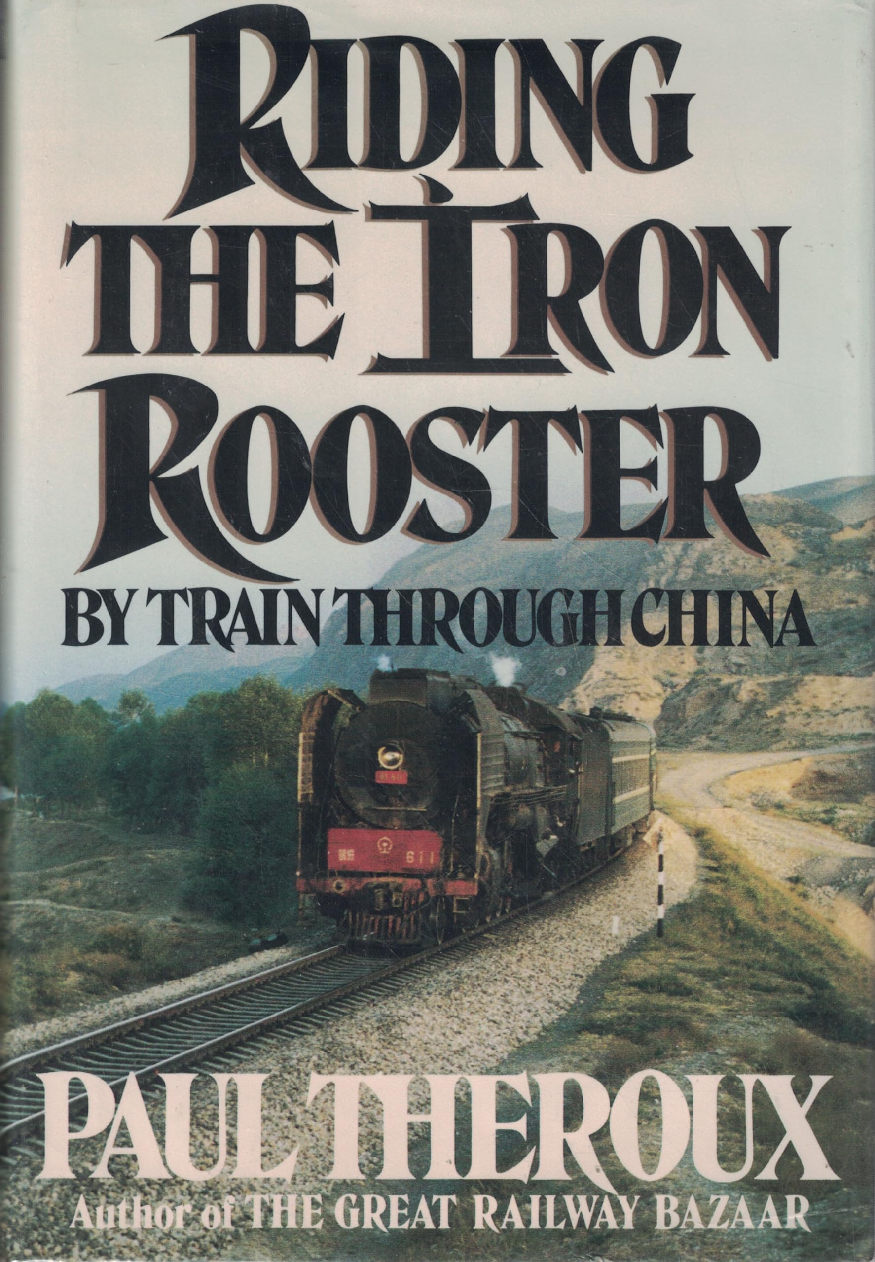 Riding the Iron Rooster: By Train through China,Used