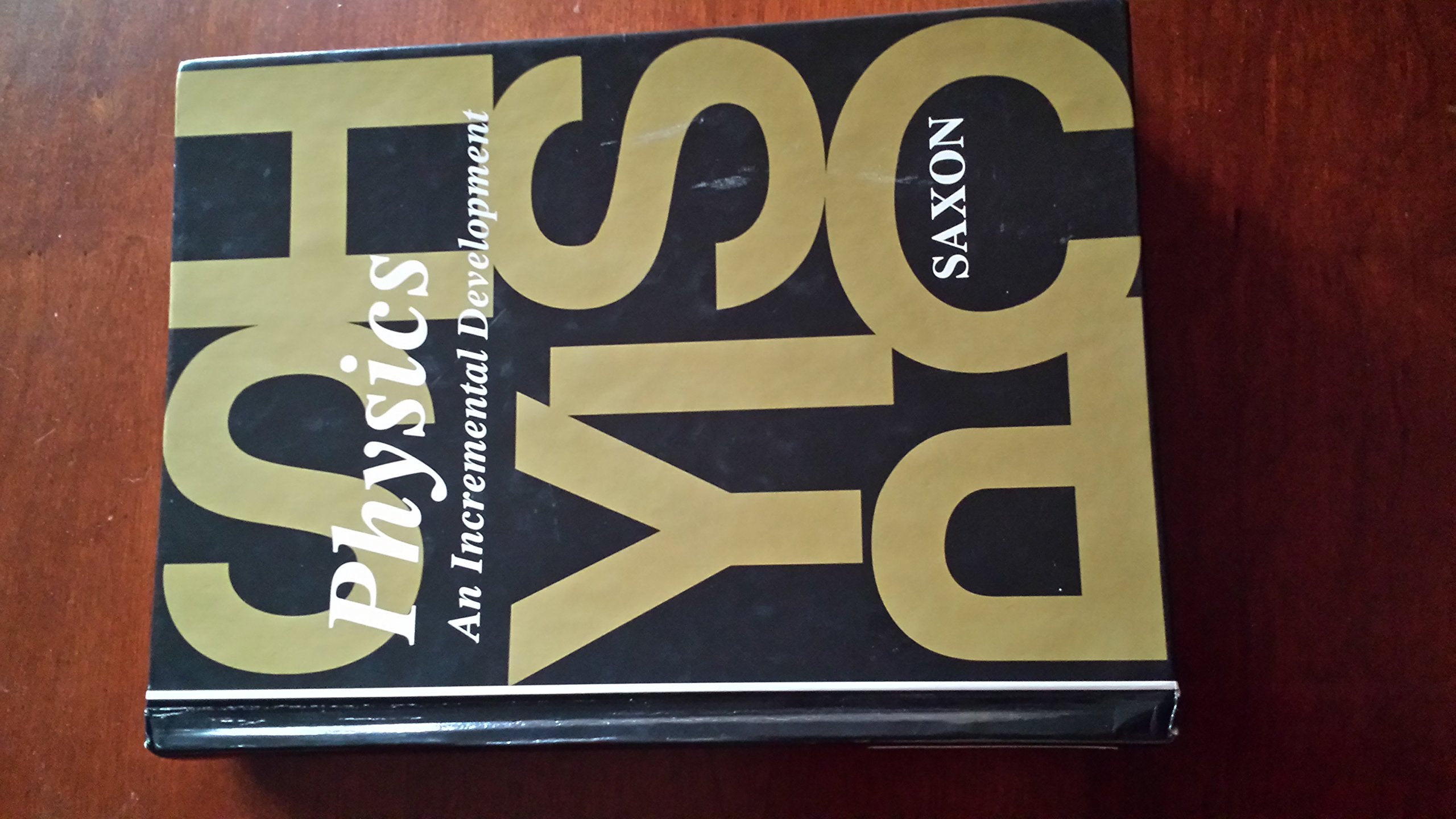 Student Edition 1993: First Edition (Saxon Physics),Used