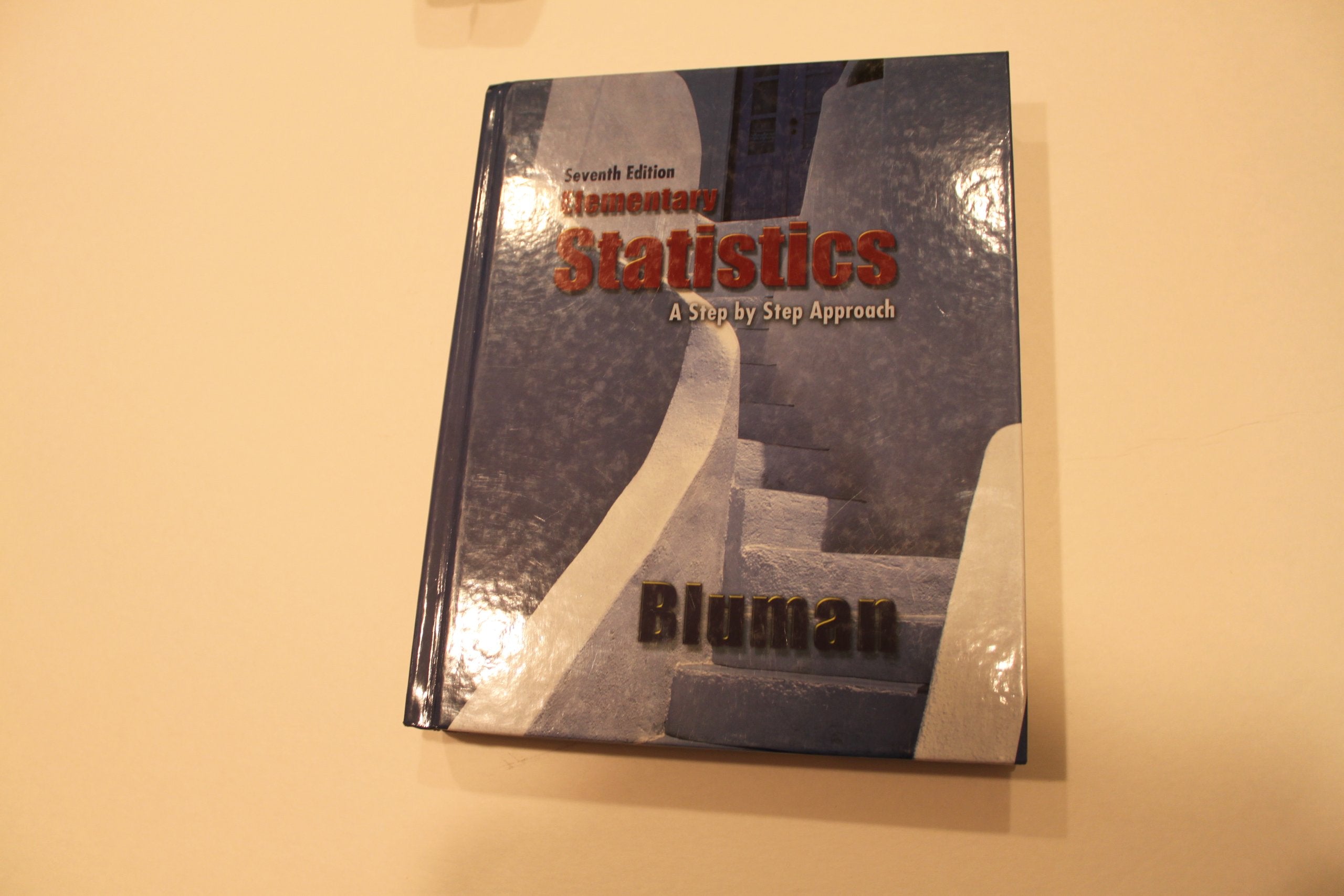 Elementary Statistics: A Step by Step Approach,New