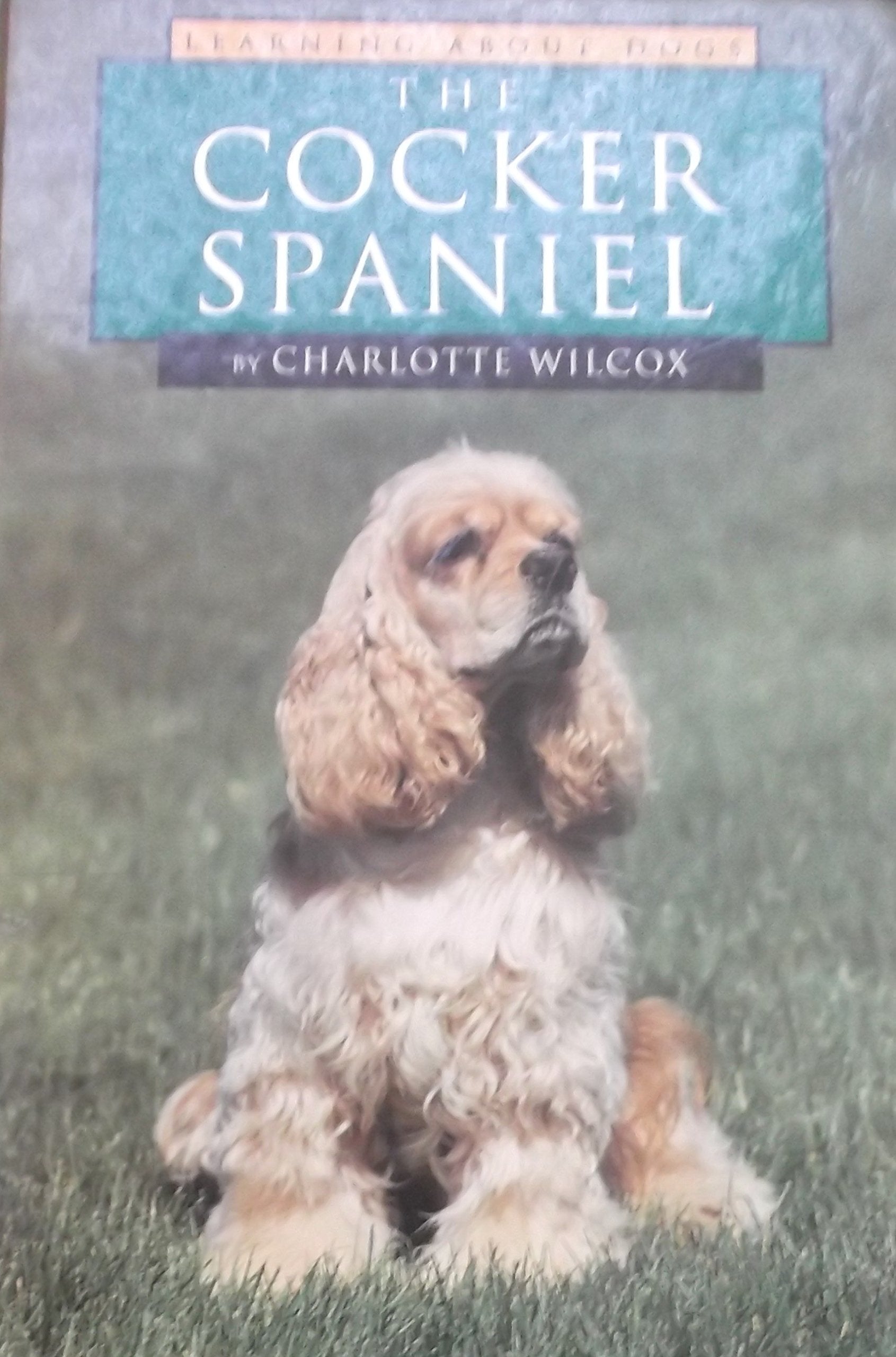 The Cocker Spaniel (Learning About Dogs),Used