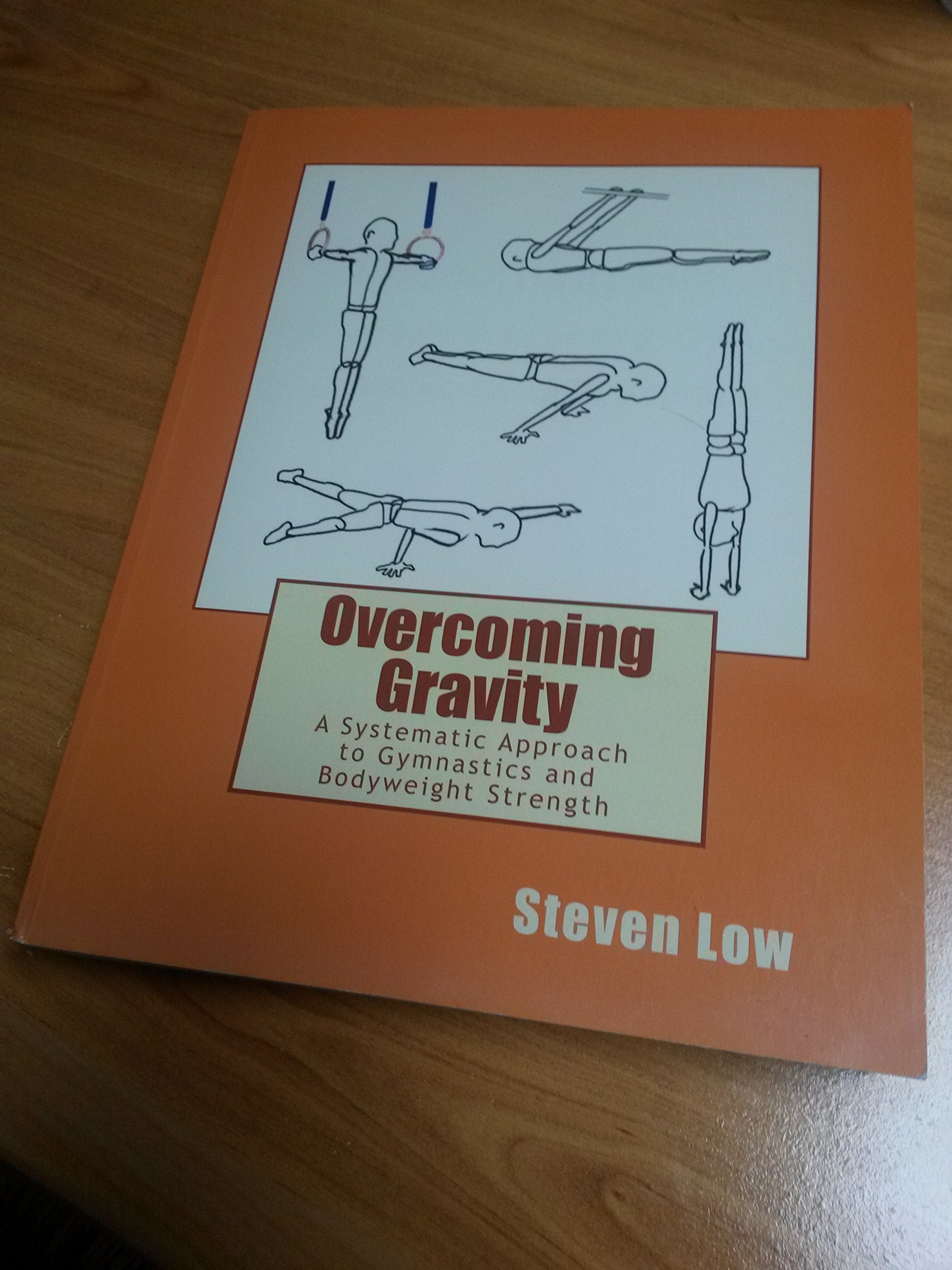 Overcoming Gravity: A Systematic Approach to Gymnastics and Bodyweight Strength by Steven Low (20111112),Used