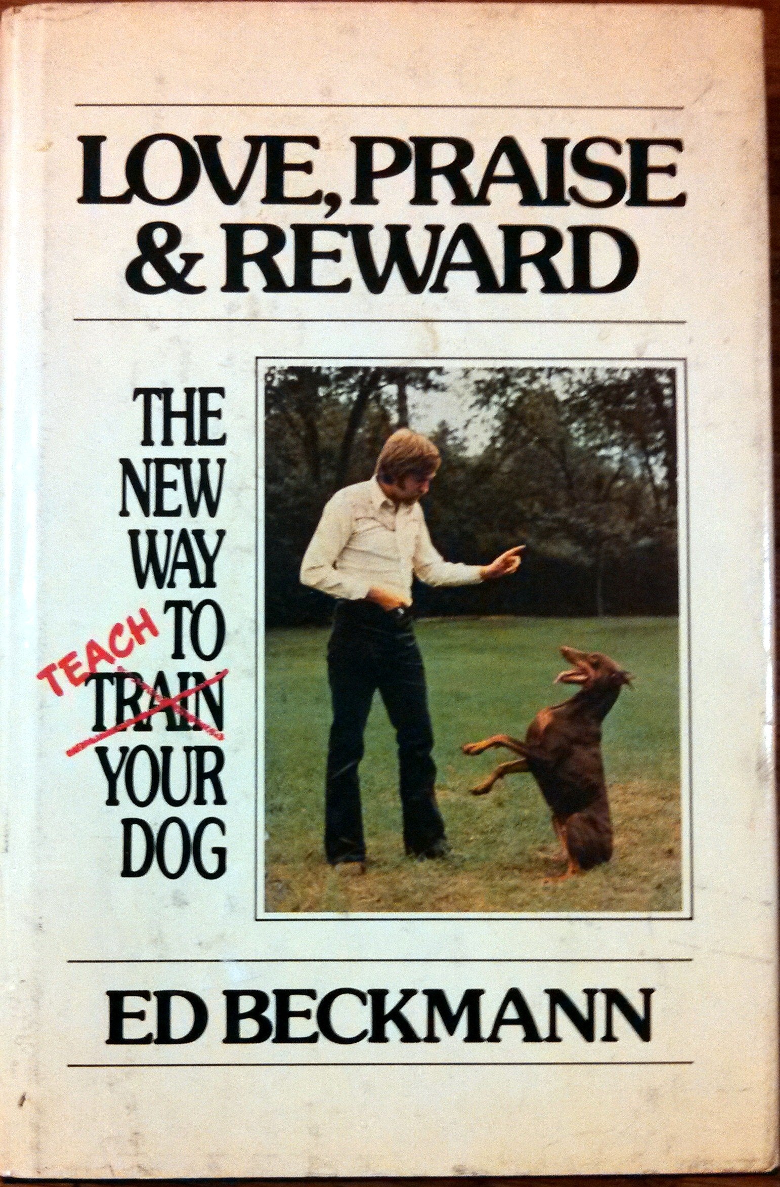Love Praise and Reward: The New Way to Train Your Dog,Used