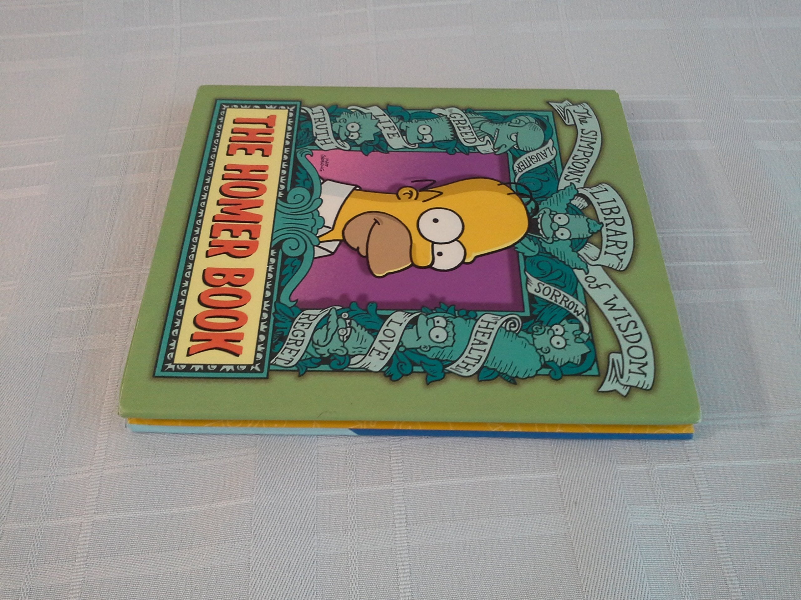 The Homer Book (Simpsons Library of Wisdom),Used