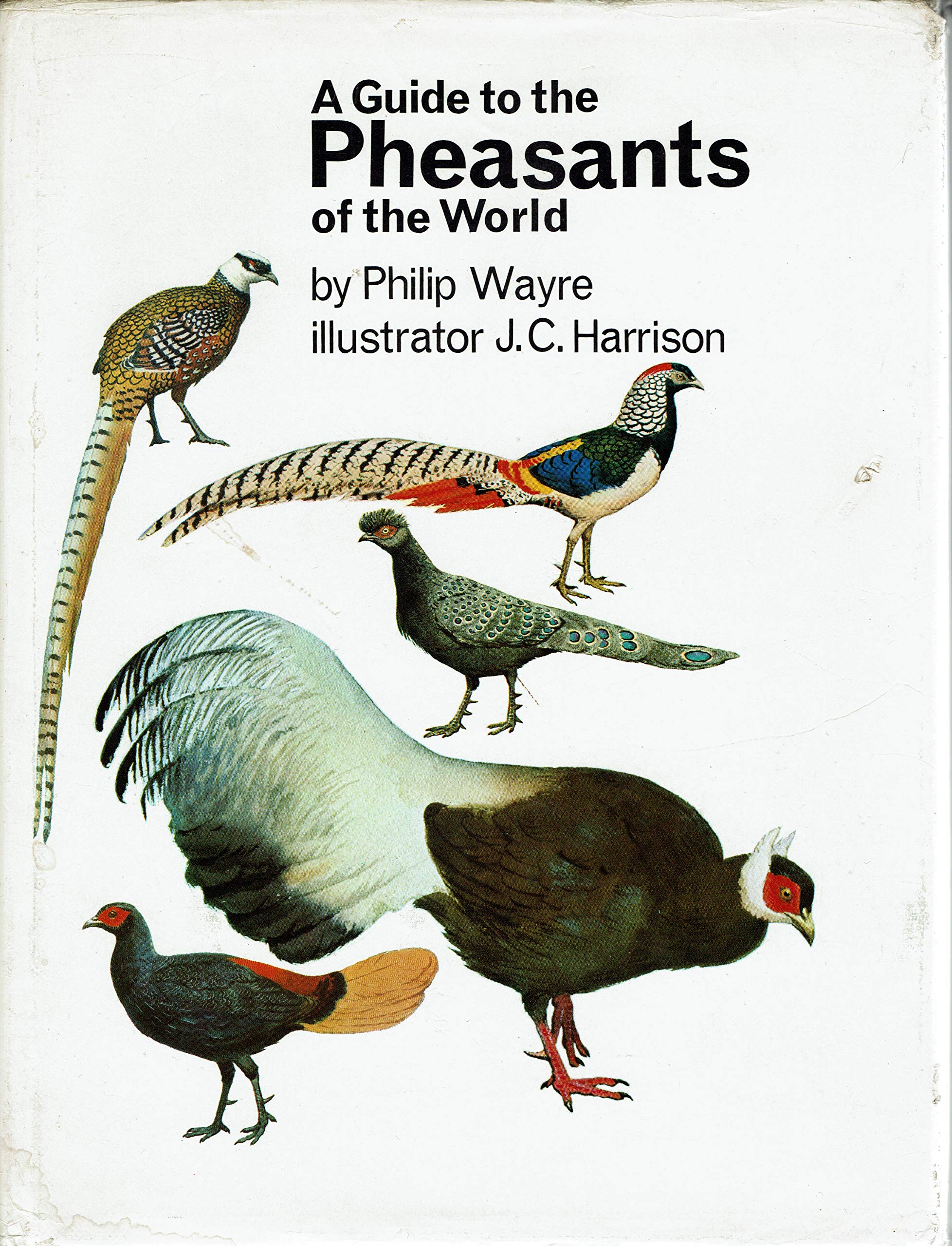 A guide to the pheasants of the world;,Used