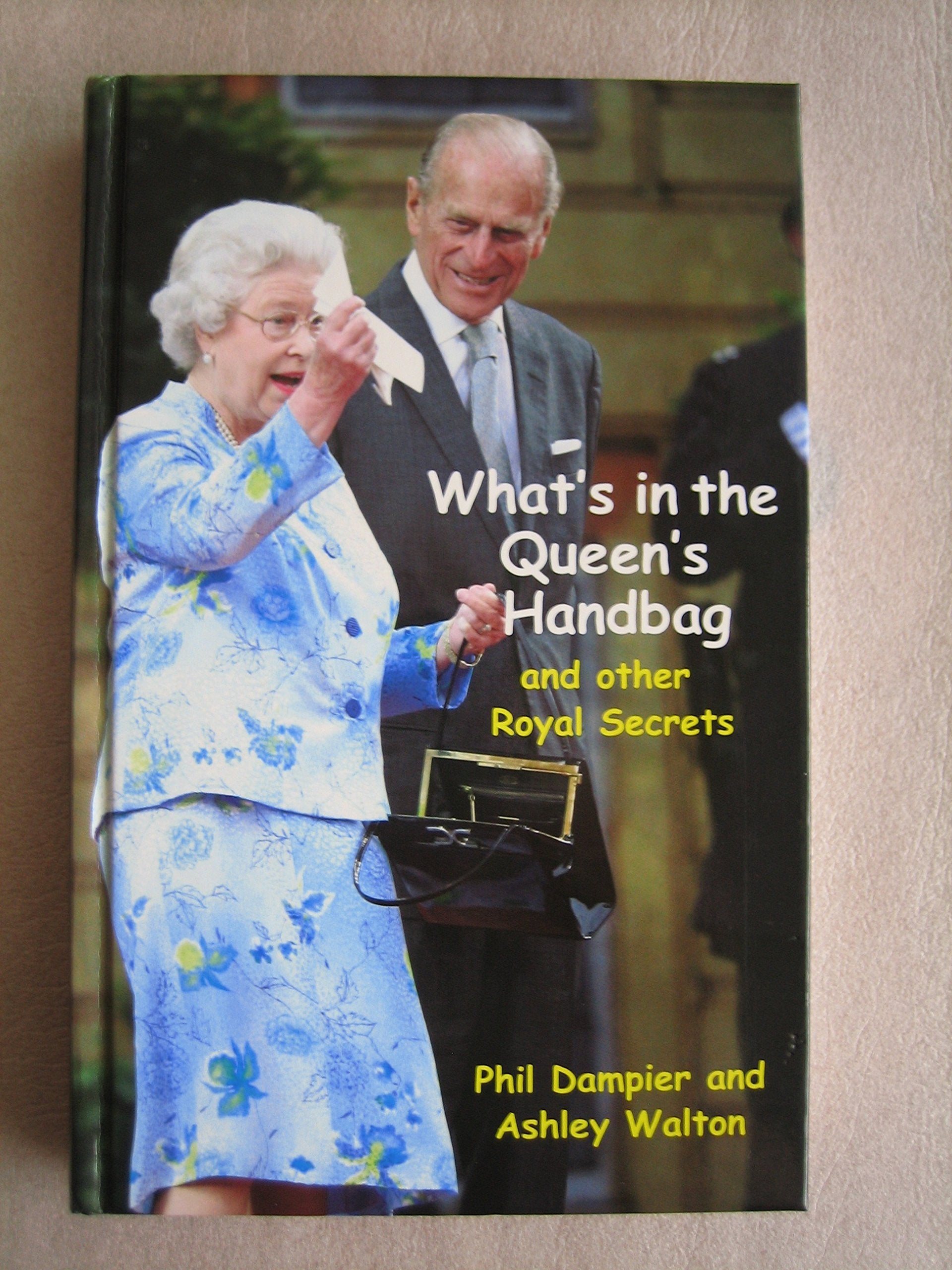 What's in the Queen's Handbag?: And Other Royal Secrets,Used