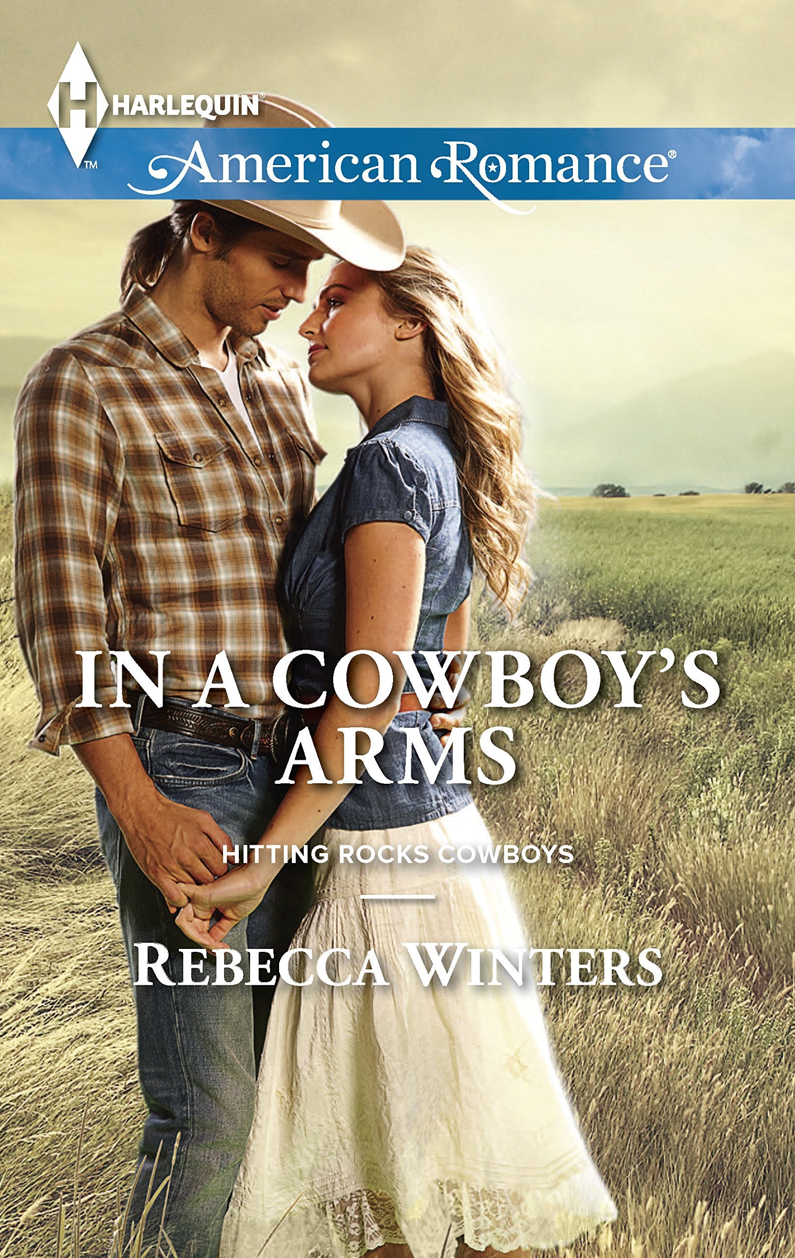 In a Cowboy's Arms (Hitting Rocks Cowboys, 1),Used