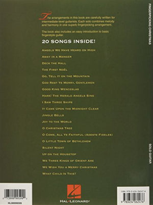 Fingerpicking Christmas: 20 Carols Arranged for Solo Guitar in Notes & Tablature,Used