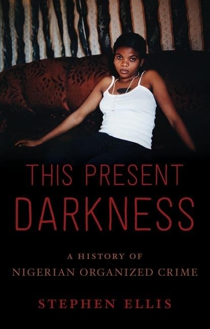 This Present Darkness: A History of Nigerian Organized Crime,Used