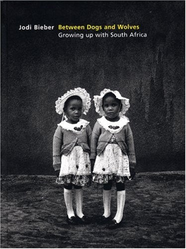 Between Dogs and Wolves: Growing up with South Africa,Used
