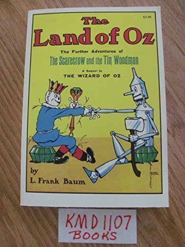 The Land of Oz: Being an Account of the Further Adventures of the Scarecrow and Tin Woodman and Also the Strange Experiences of ,Used