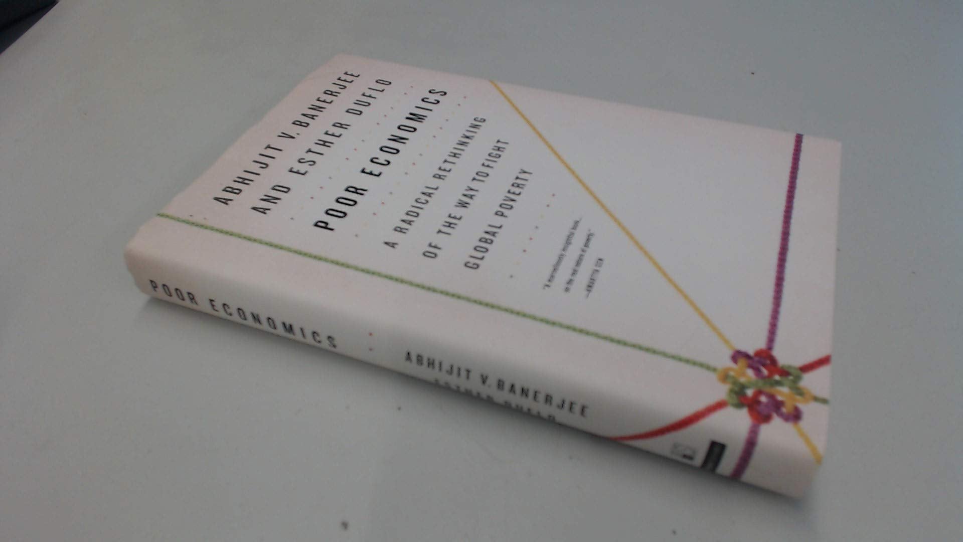 Poor Economics: A Radical Rethinking of the Way to Fight Global Poverty,Used