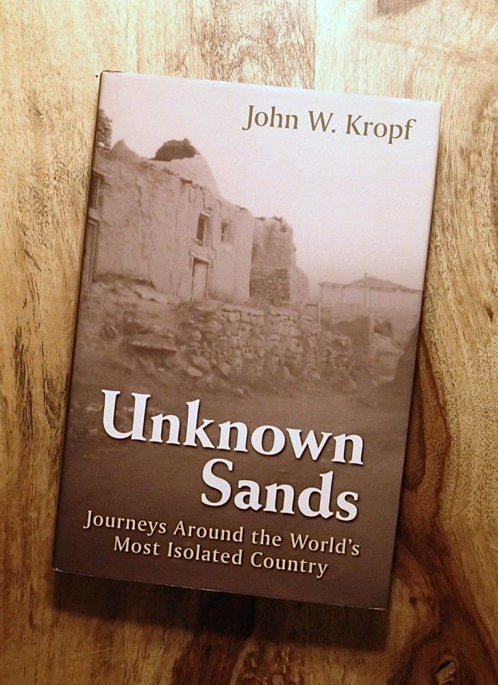 Unknown Sands: Journeys Around The World'S Most Isolated Country-used