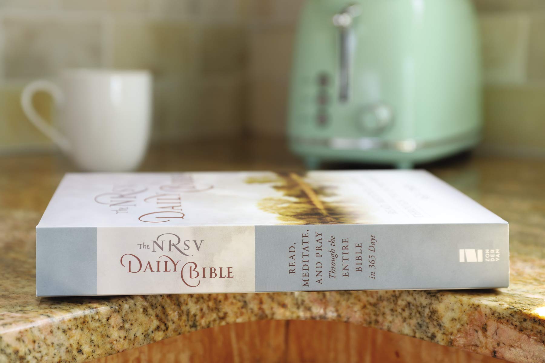 The NRSV Daily Bible: Read, Meditate, and Pray Through the Entire Bible in 365 Days,Used