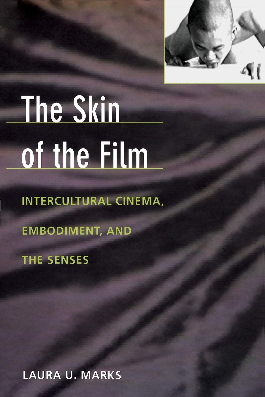 The Skin Of The Film: Intercultural Cinema, Embodiment, And The Senses,Used
