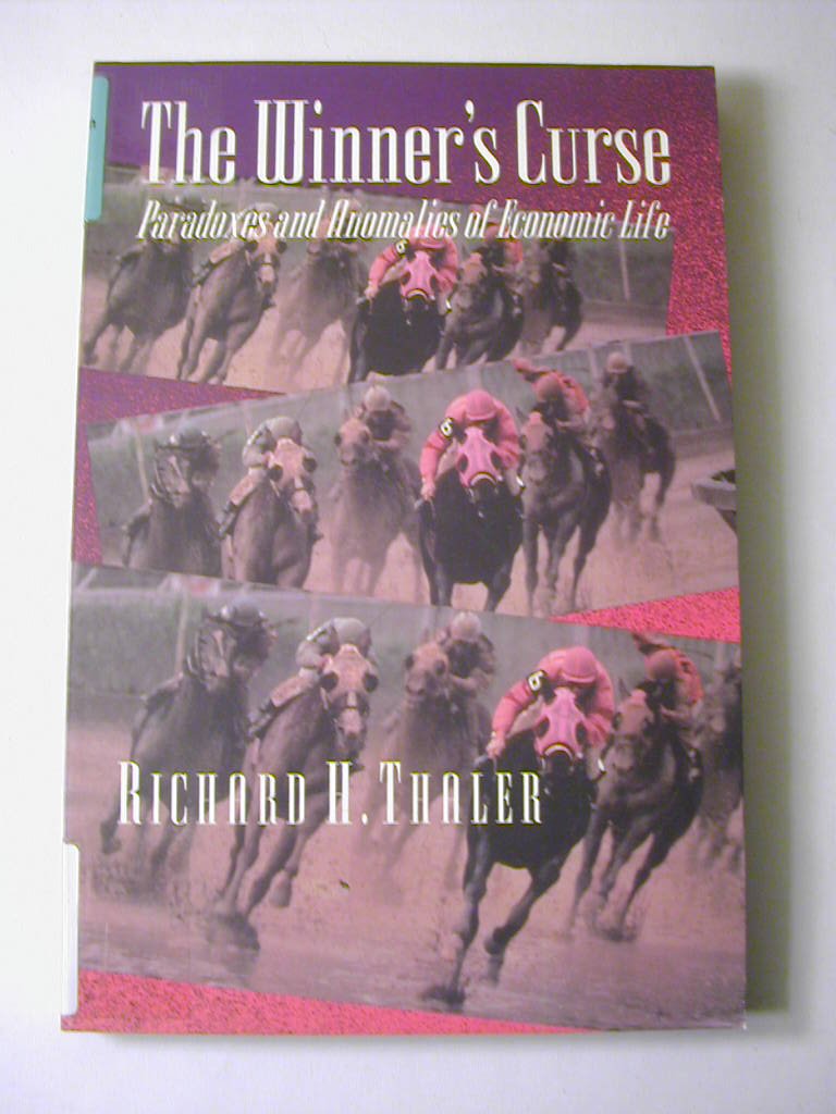The Winner'S Curse: Paradoxes And Anomalies Of Economic Life