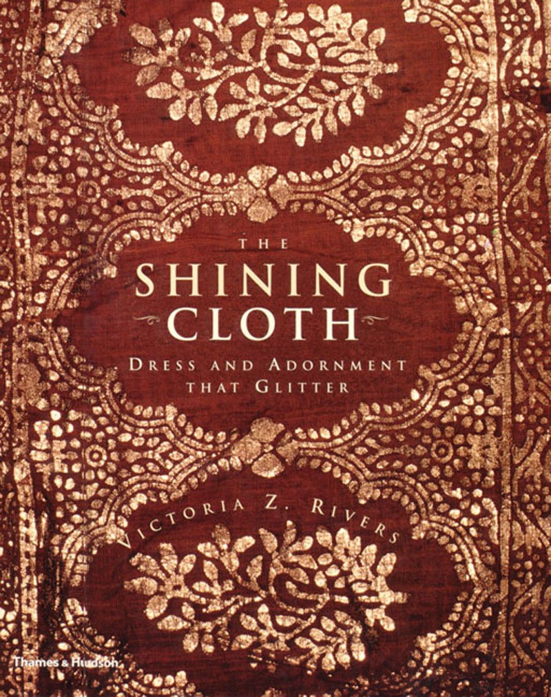 The Shining Cloth: Dress and Adornment That Glitters,Used