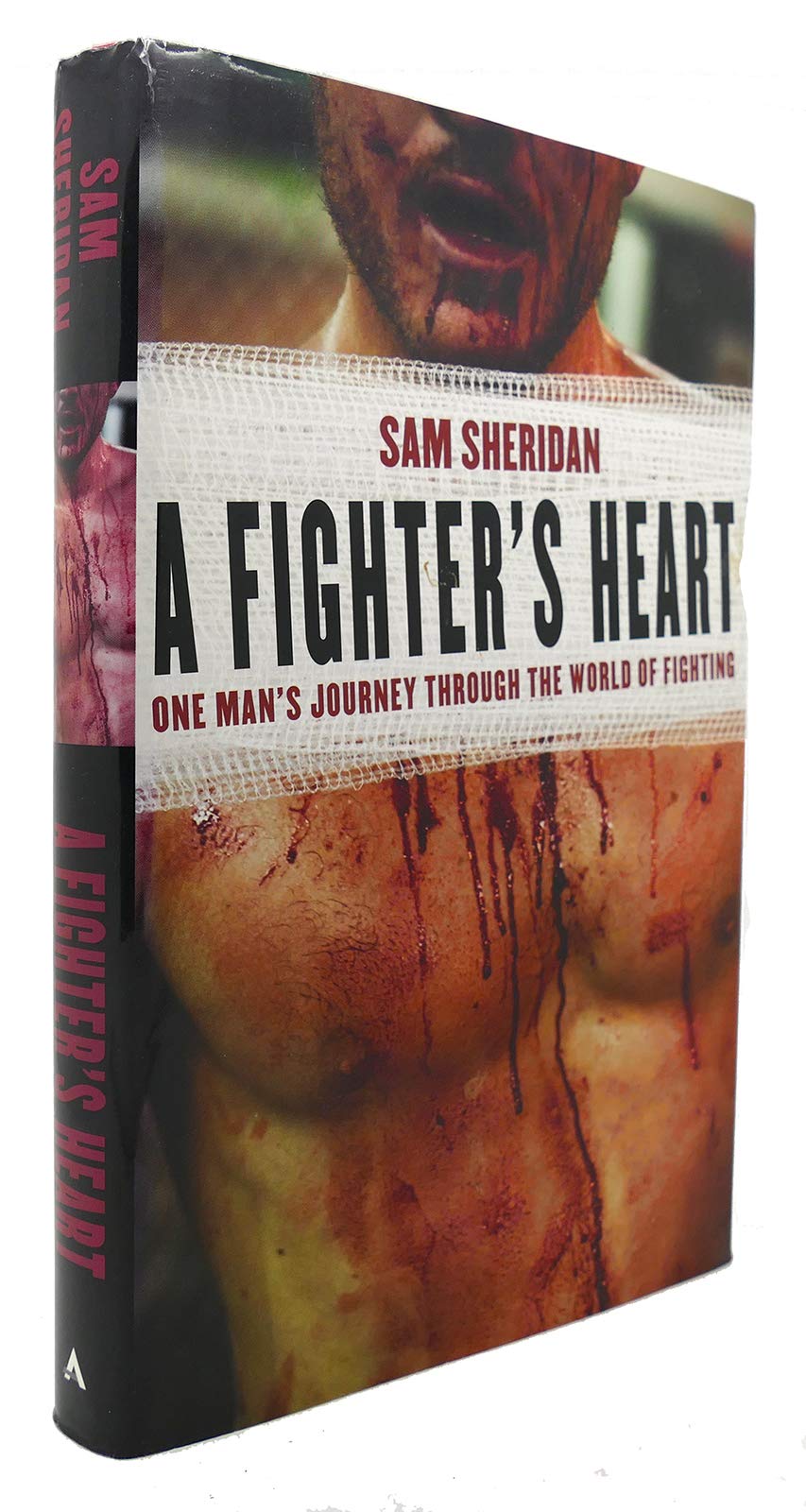 A Fighter's Heart: One Man's Journey Through the World of Fighting,Used