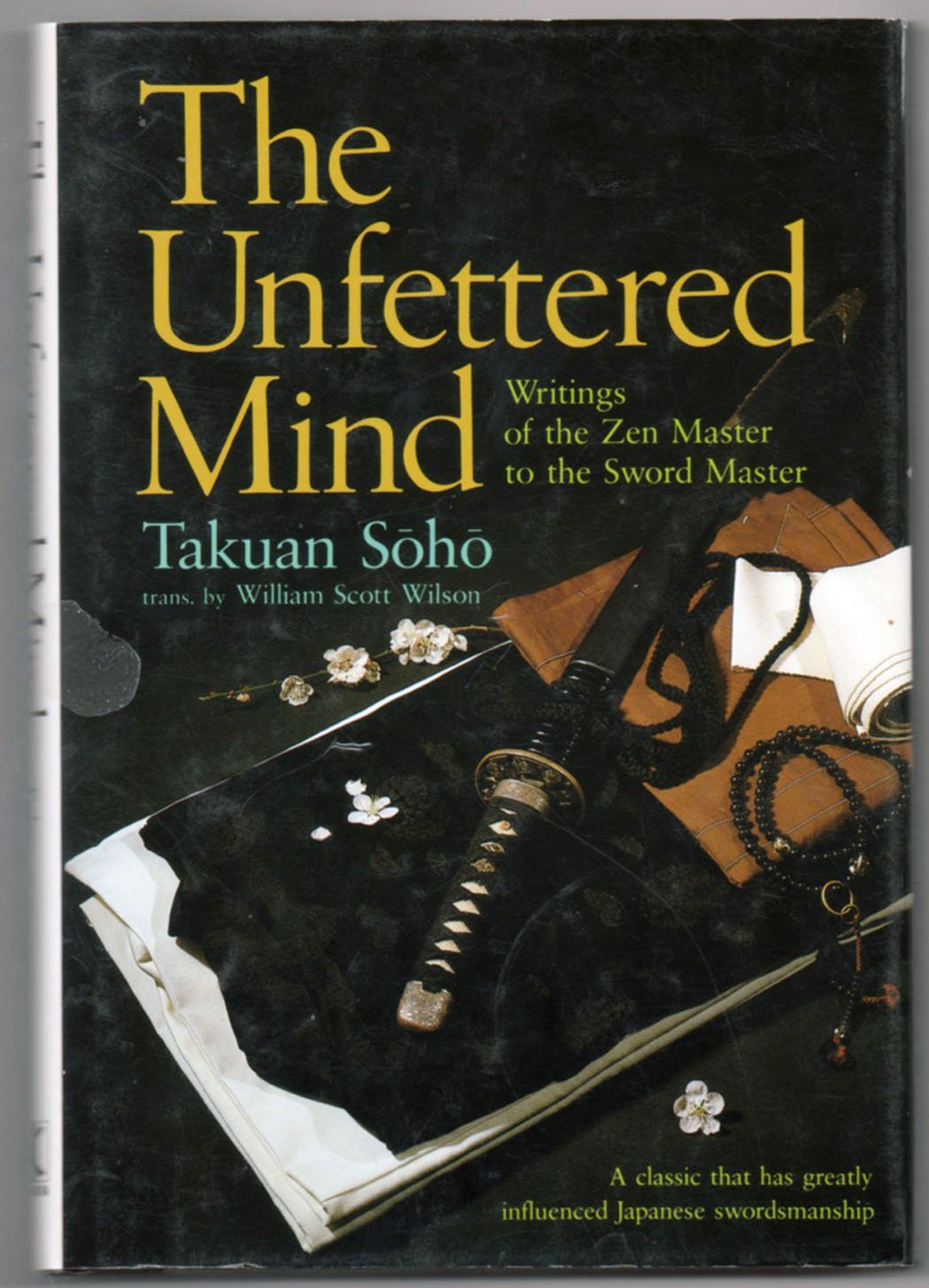 The Unfettered Mind: Writings of the Zen Master to the Sword Master (English and Japanese Edition),Used
