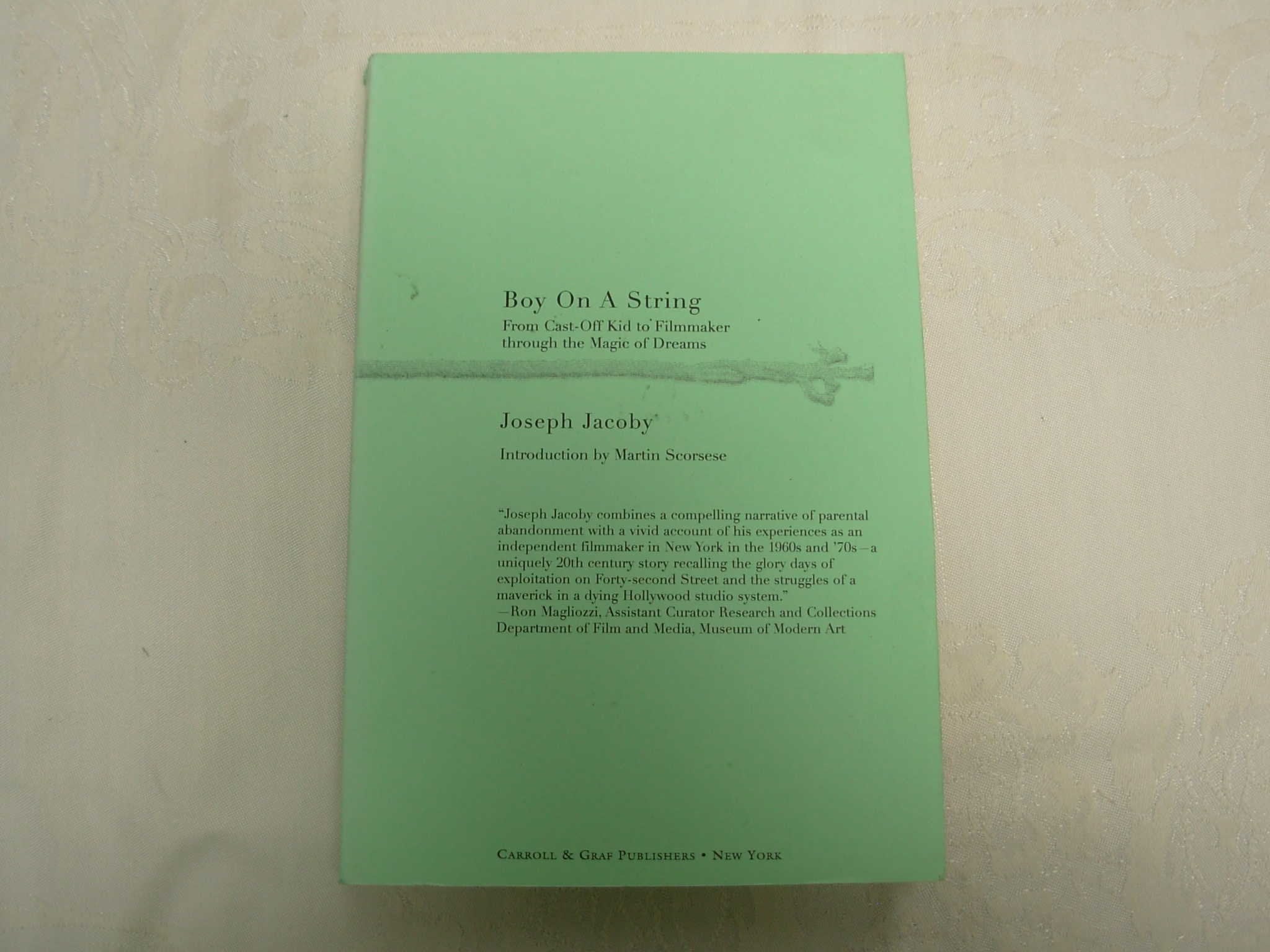 Boy on a String: From CastOff Kid to Filmmaker Through the Magic of Dreams,Used