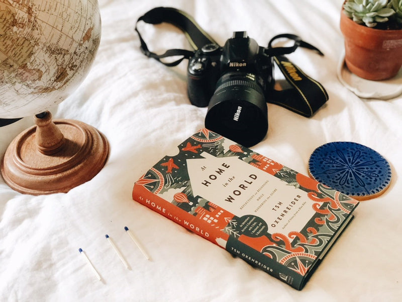 At Home in the World: Reflections on Belonging While Wandering the Globe,Used