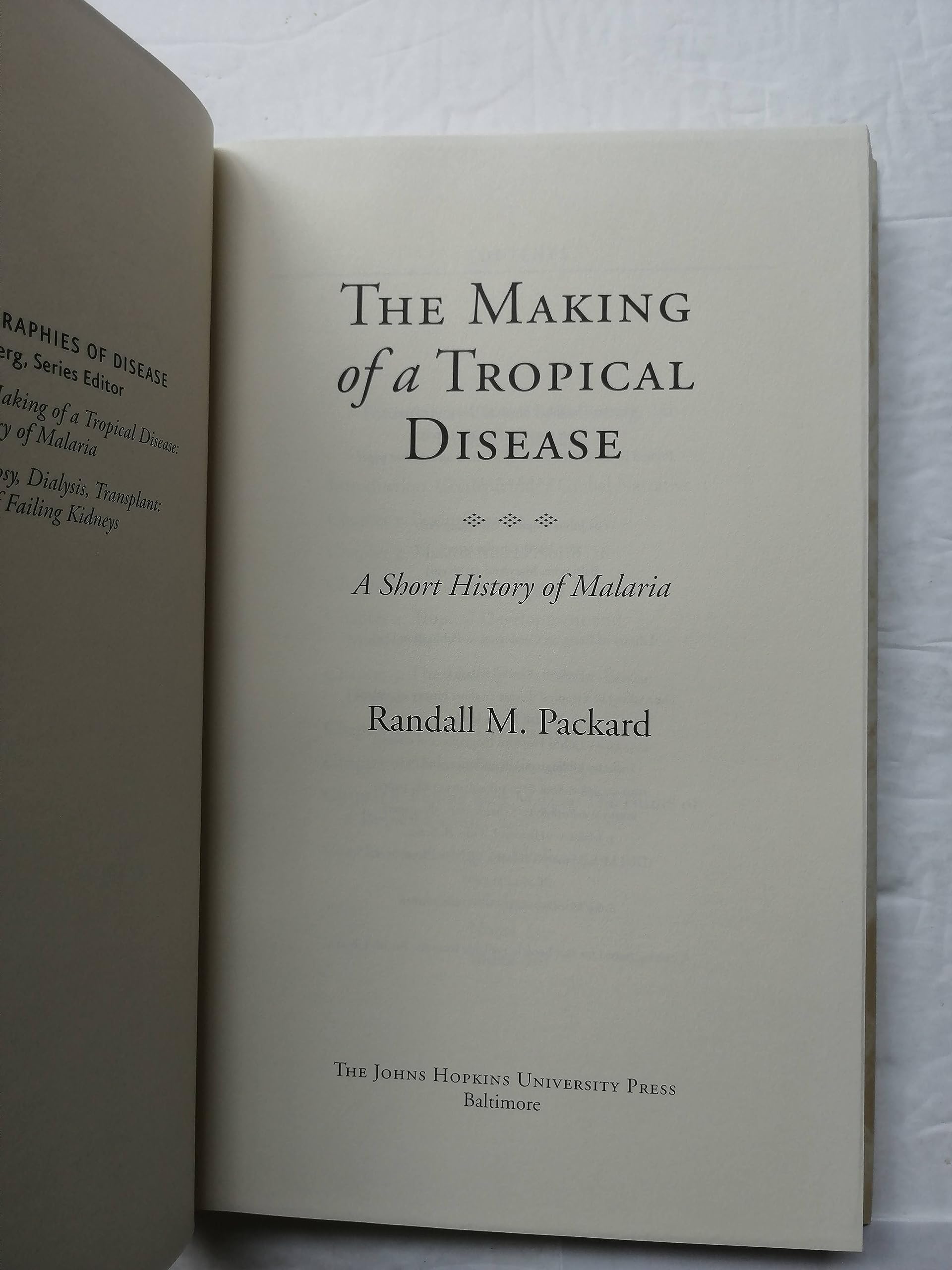 The Making of a Tropical Disease: A Short History of Malaria (Johns Hopkins Biographies of Disease),Used