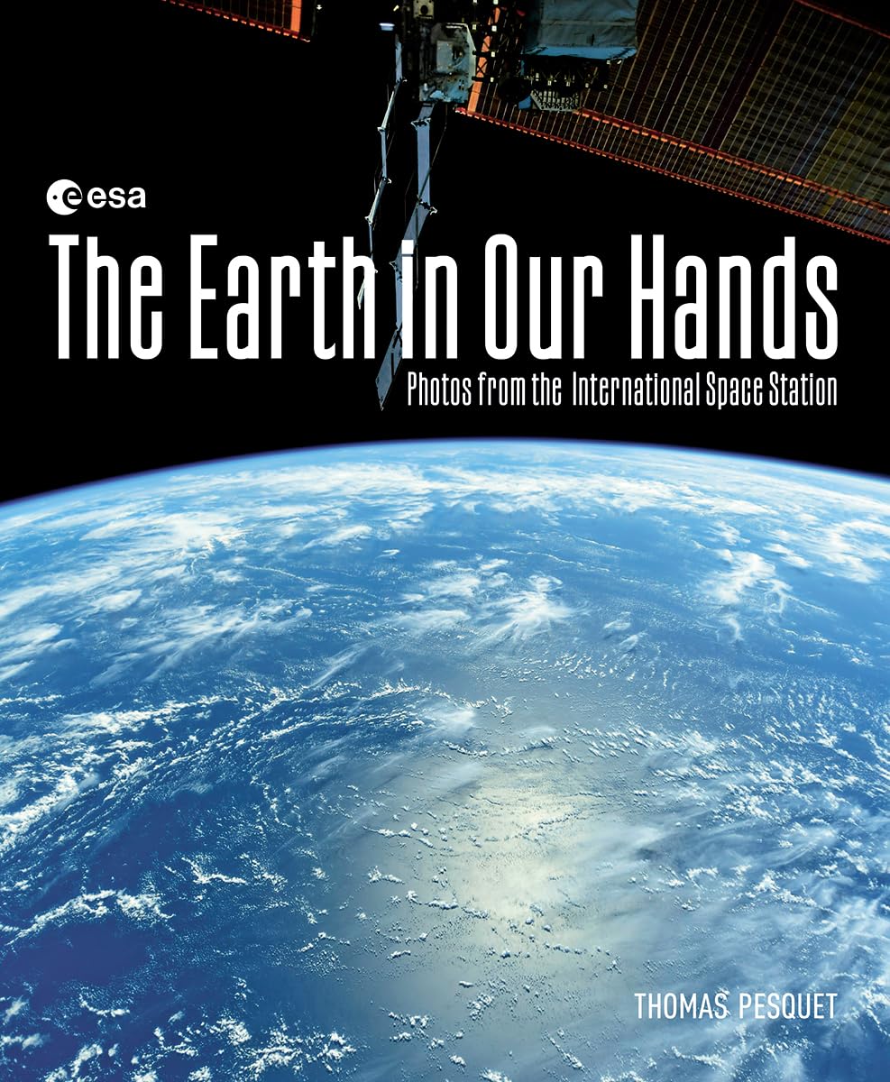 The Earth In Our Hands: Photos From The International Space Station,Used