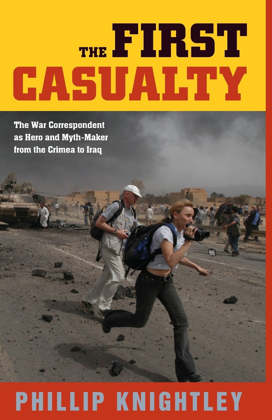 The First Casualty: The War Correspondent as Hero and Myth-Maker from the Crimea to Iraq (Johns Hopkins Paperback)-Used