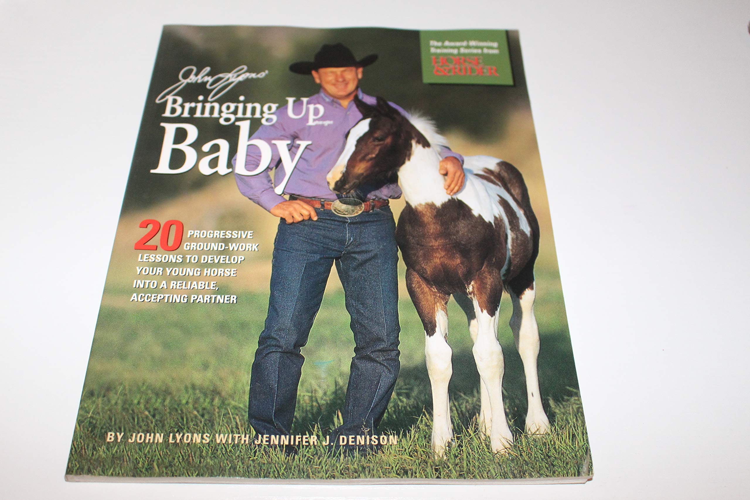 John Lyons' Bringing Up Baby: 20 Progressive GroundWork Lessons to Develop Your Young Horse into a Reliable, Accepting Partner,Used