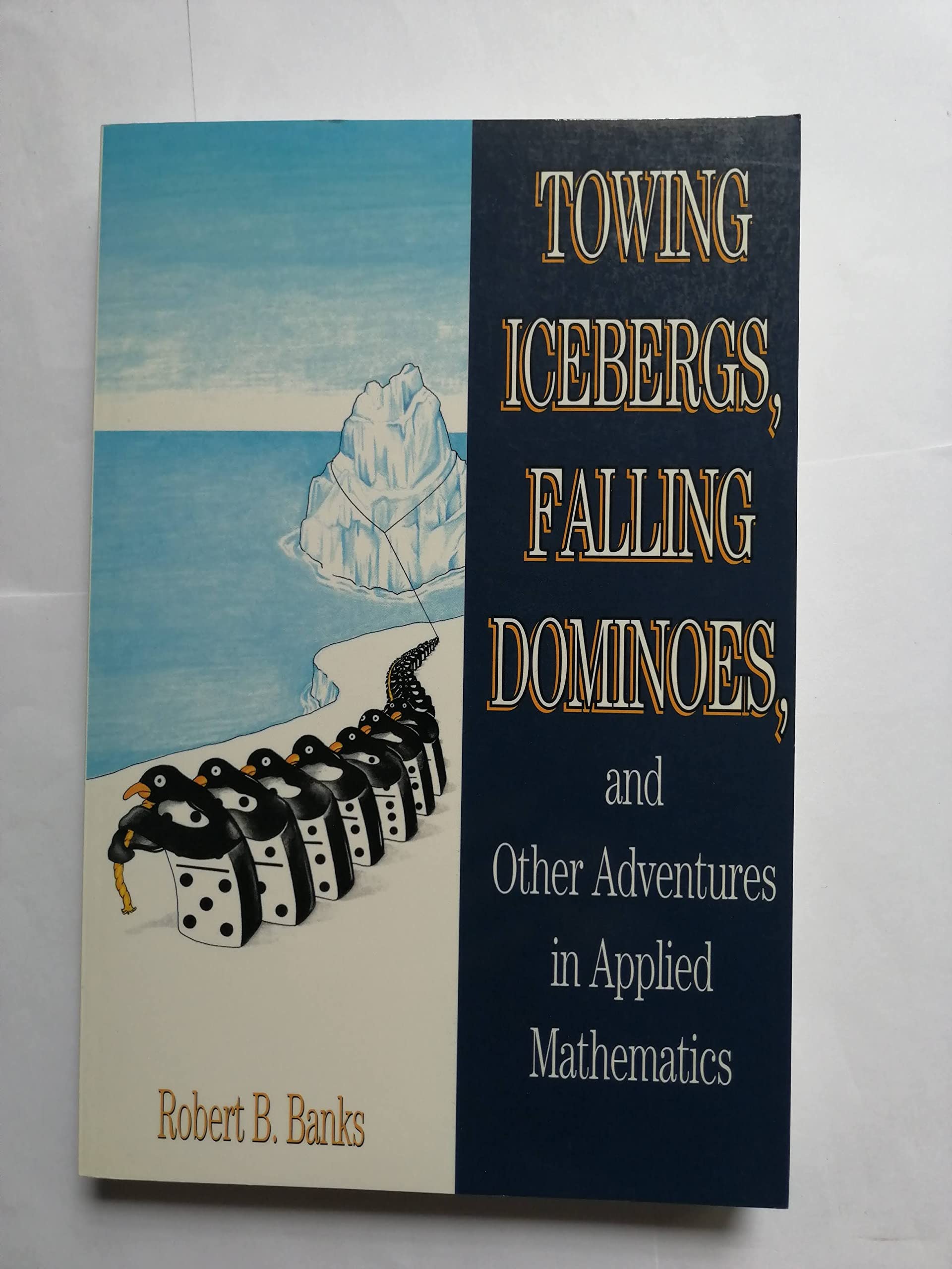 Towing Icebergs, Falling Dominoes, and Other Adventures in Applied Mathematics,Used