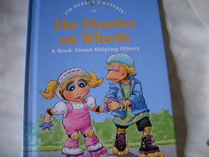 Jim Henson's Muppets in The disaster on wheels: A book about helping others (Values to grow on),Used
