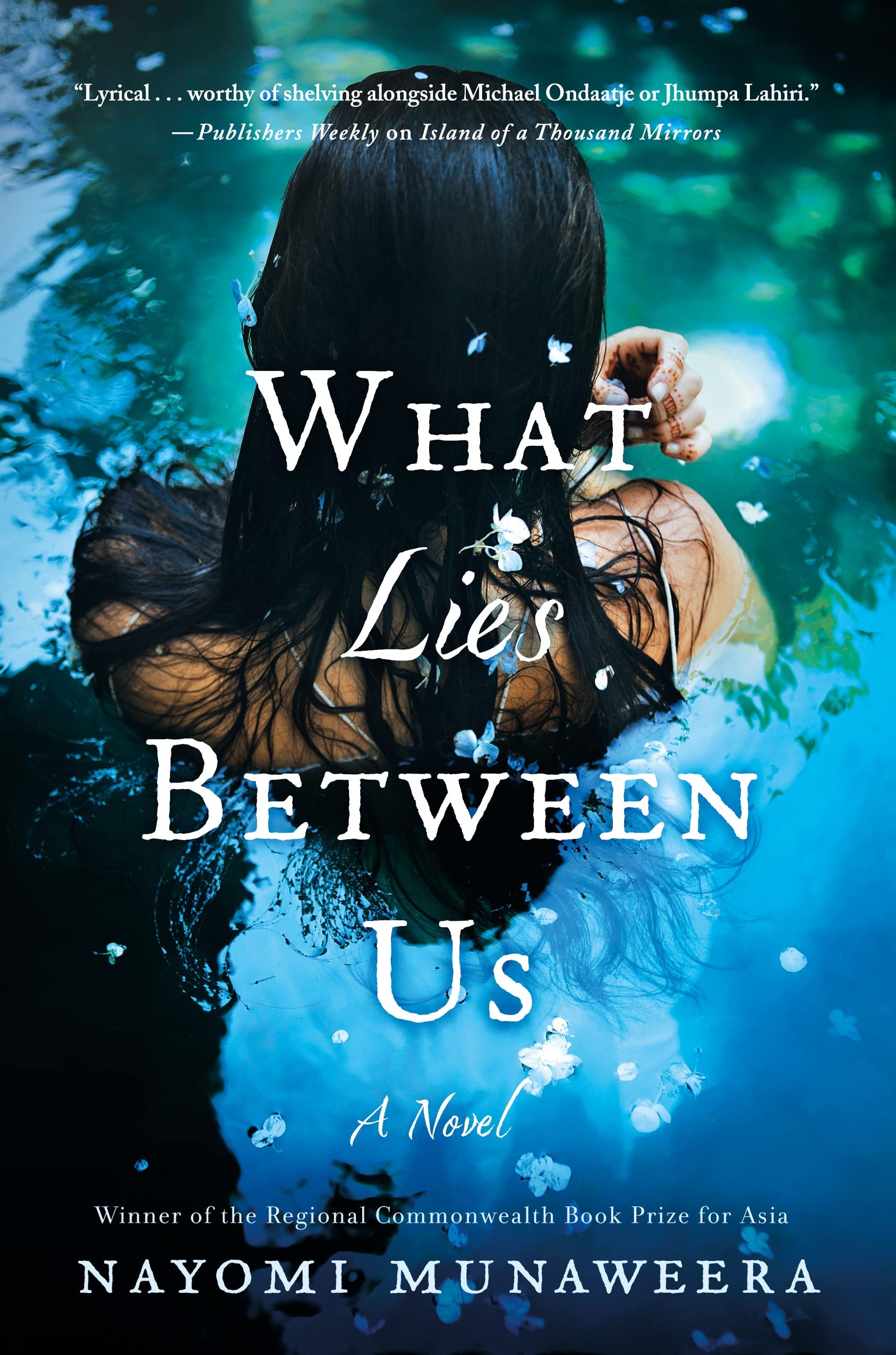 St. Martin's Press What Lies Between Us: A Novel - Engaging Fiction Book