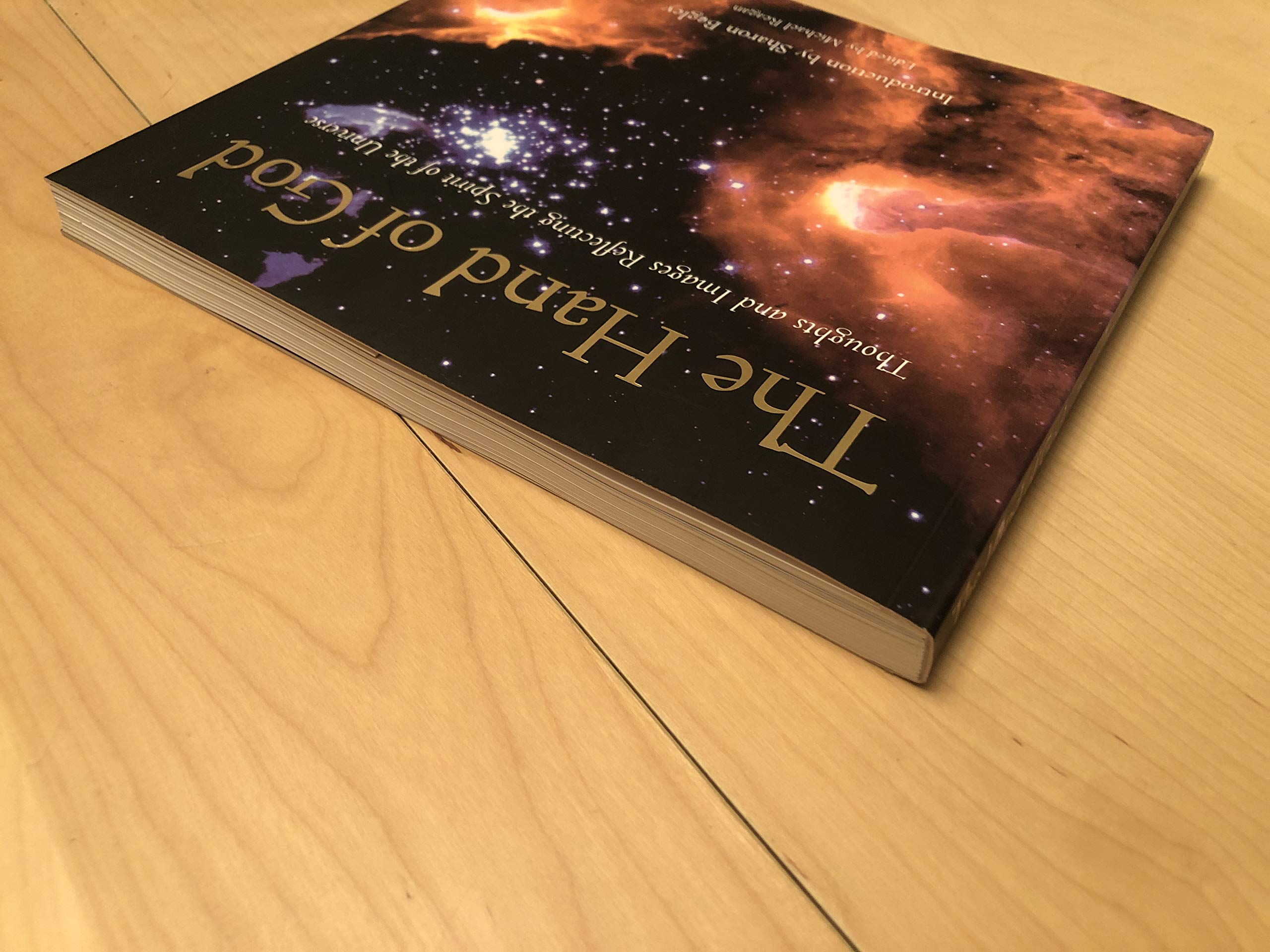 The Hand of God: Thoughts and Images Reflecting the Spirit of the Universe,Used