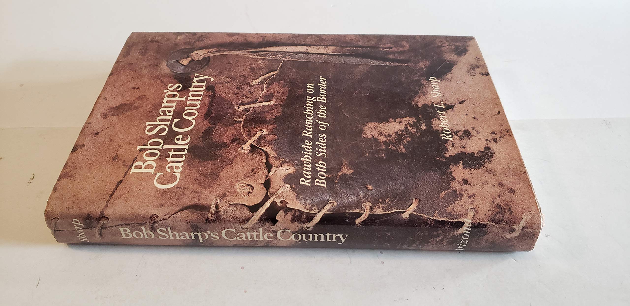 Bob Sharp's Cattle Country: Rawhide Ranching on Both Sides of the Border,Used