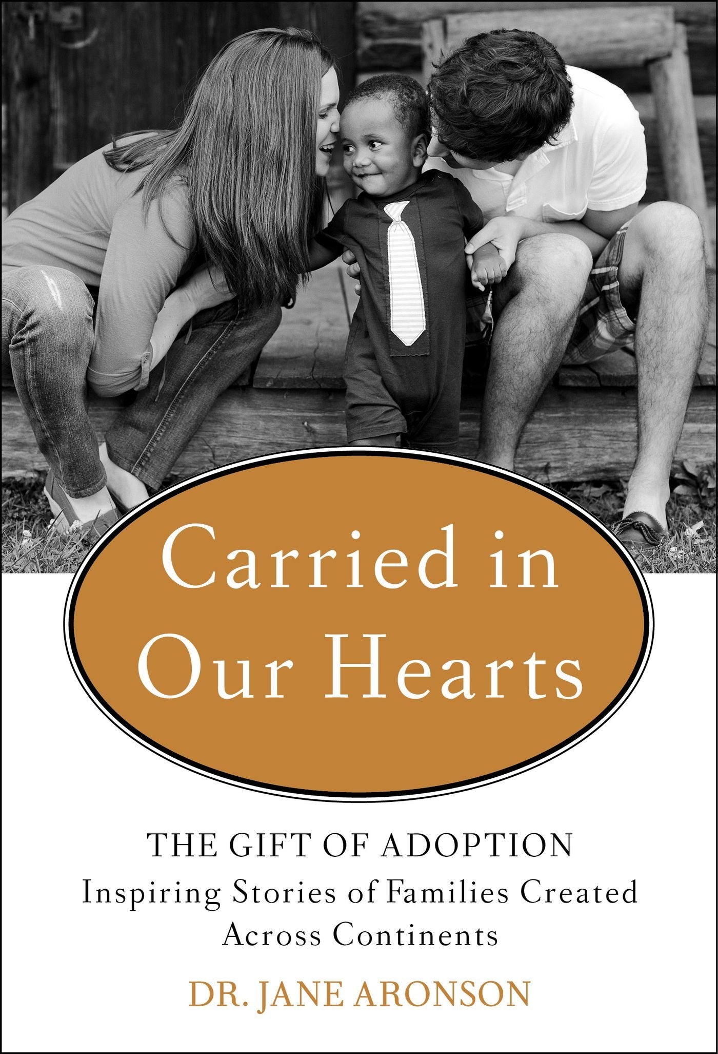 Carried In Our Hearts: The Gift Of Adoption: Inspiring Stories Of Families Created Across Continents-used