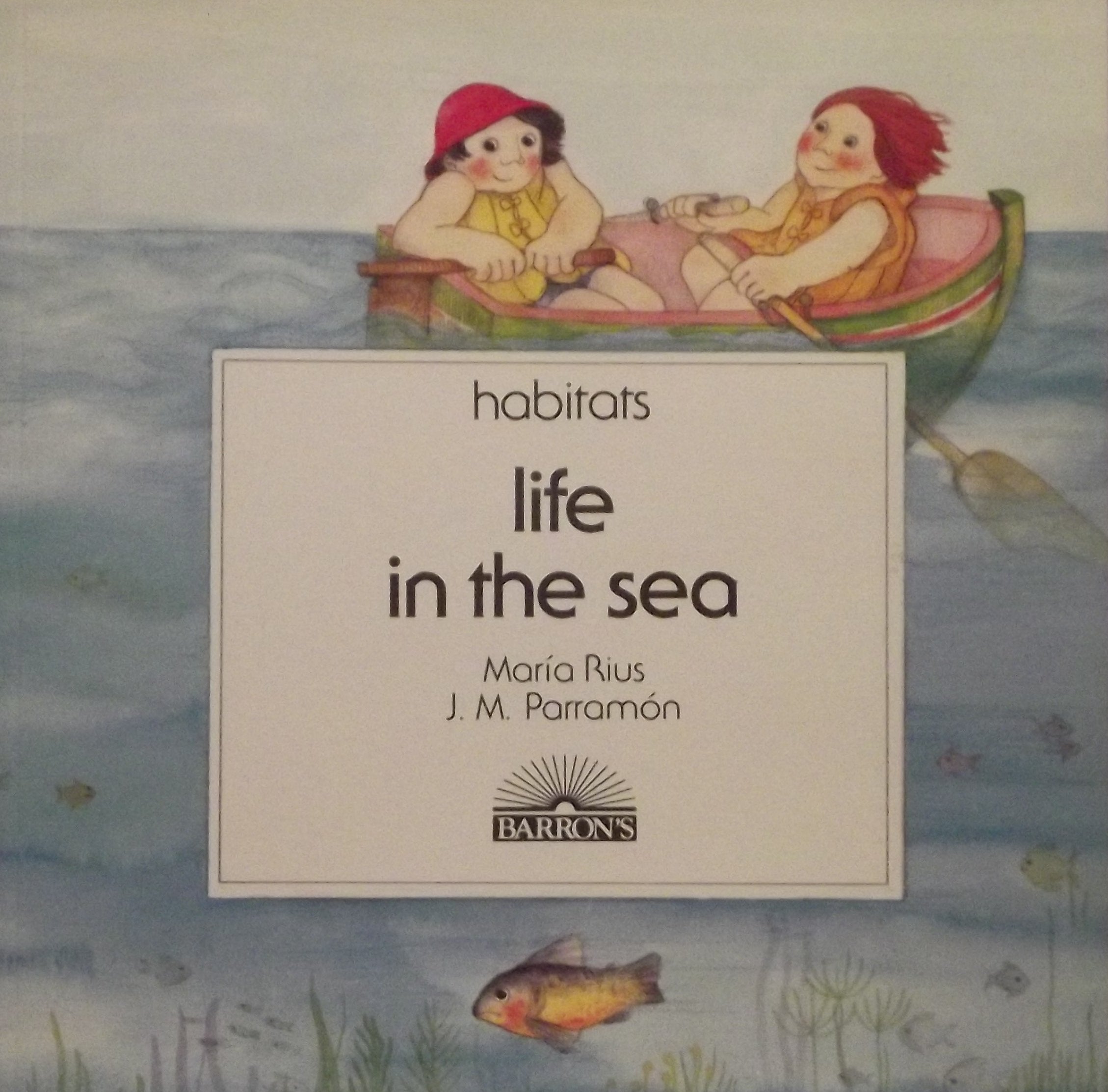Life in the Sea (Habitats) (English and Spanish Edition),Used