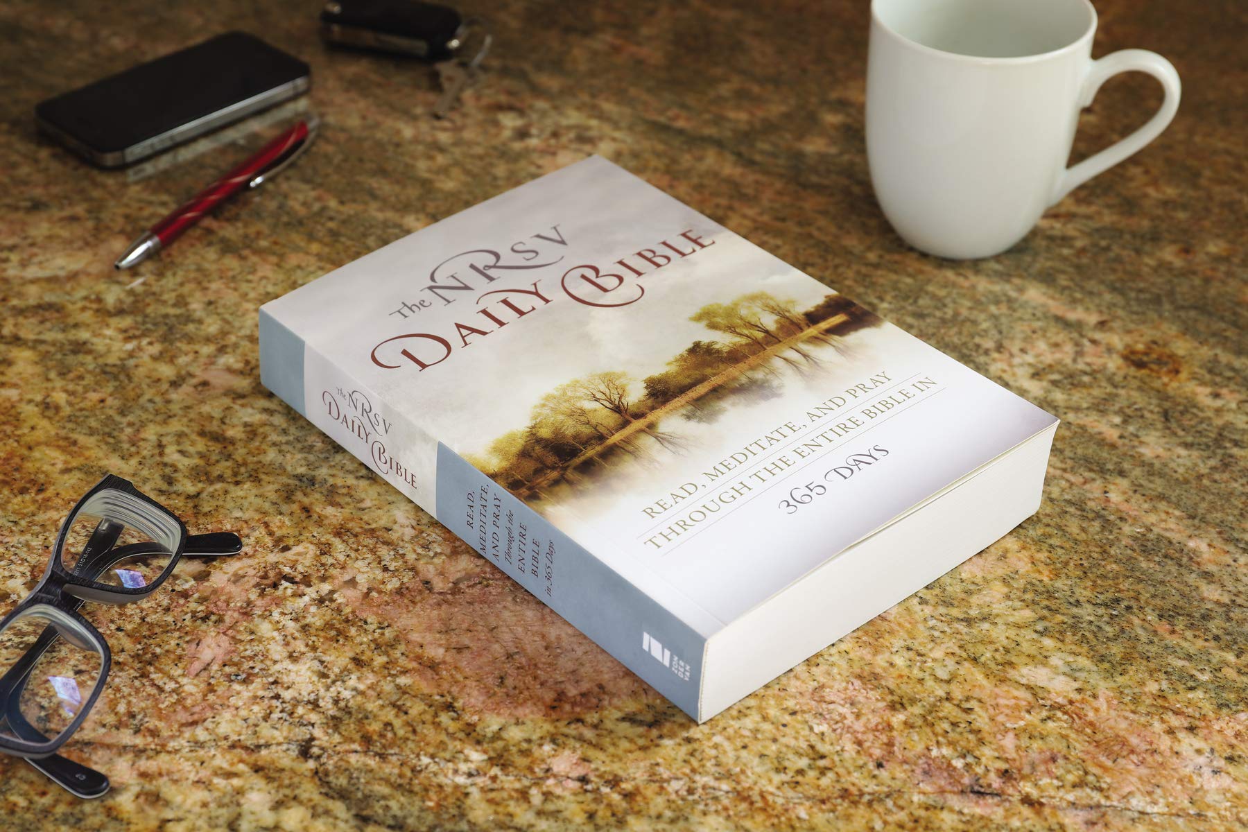 The NRSV Daily Bible: Read, Meditate, and Pray Through the Entire Bible in 365 Days,Used