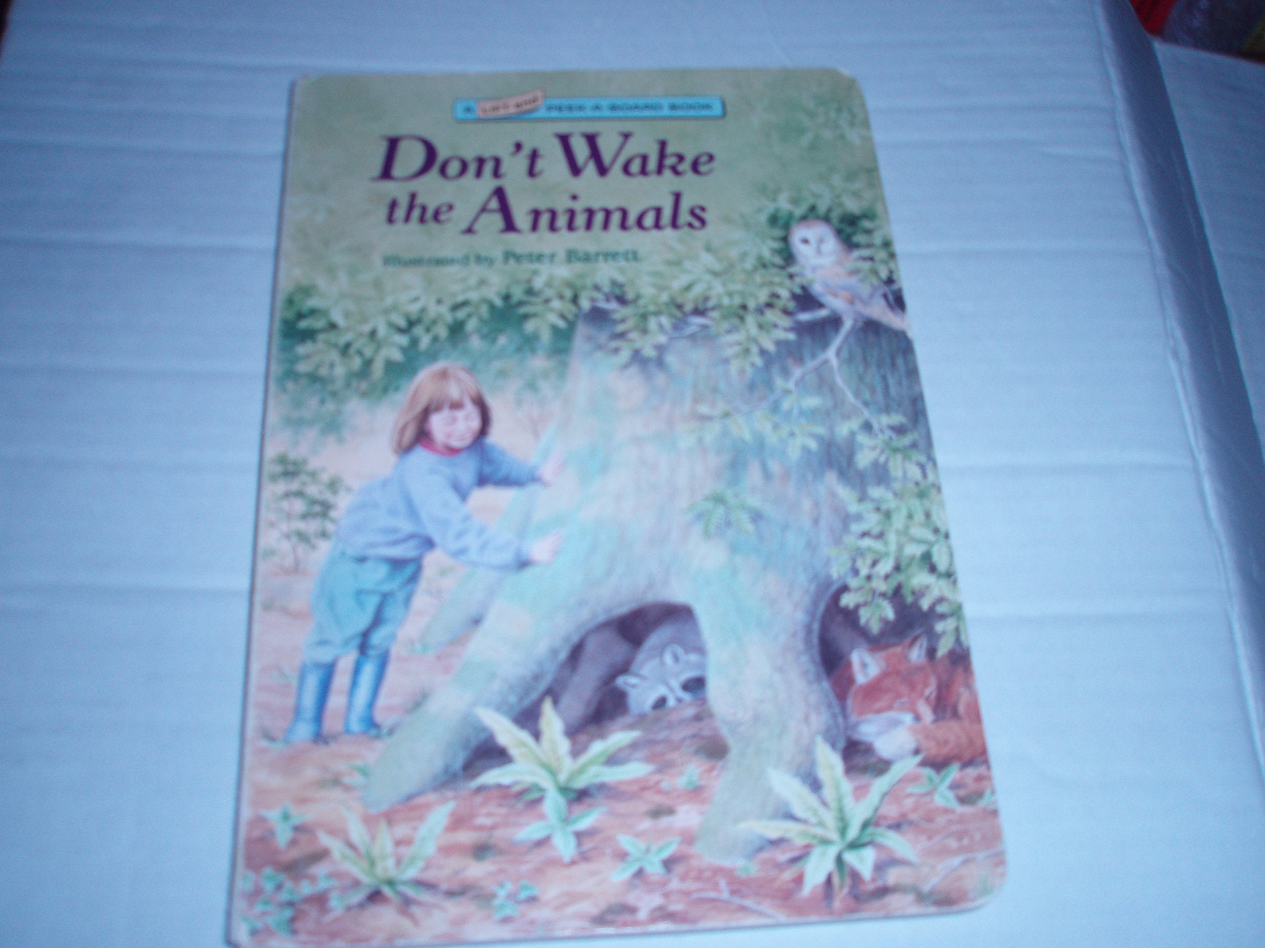 DONT WAKE THE ANIMALS (LiftAndPeekABoard Book)