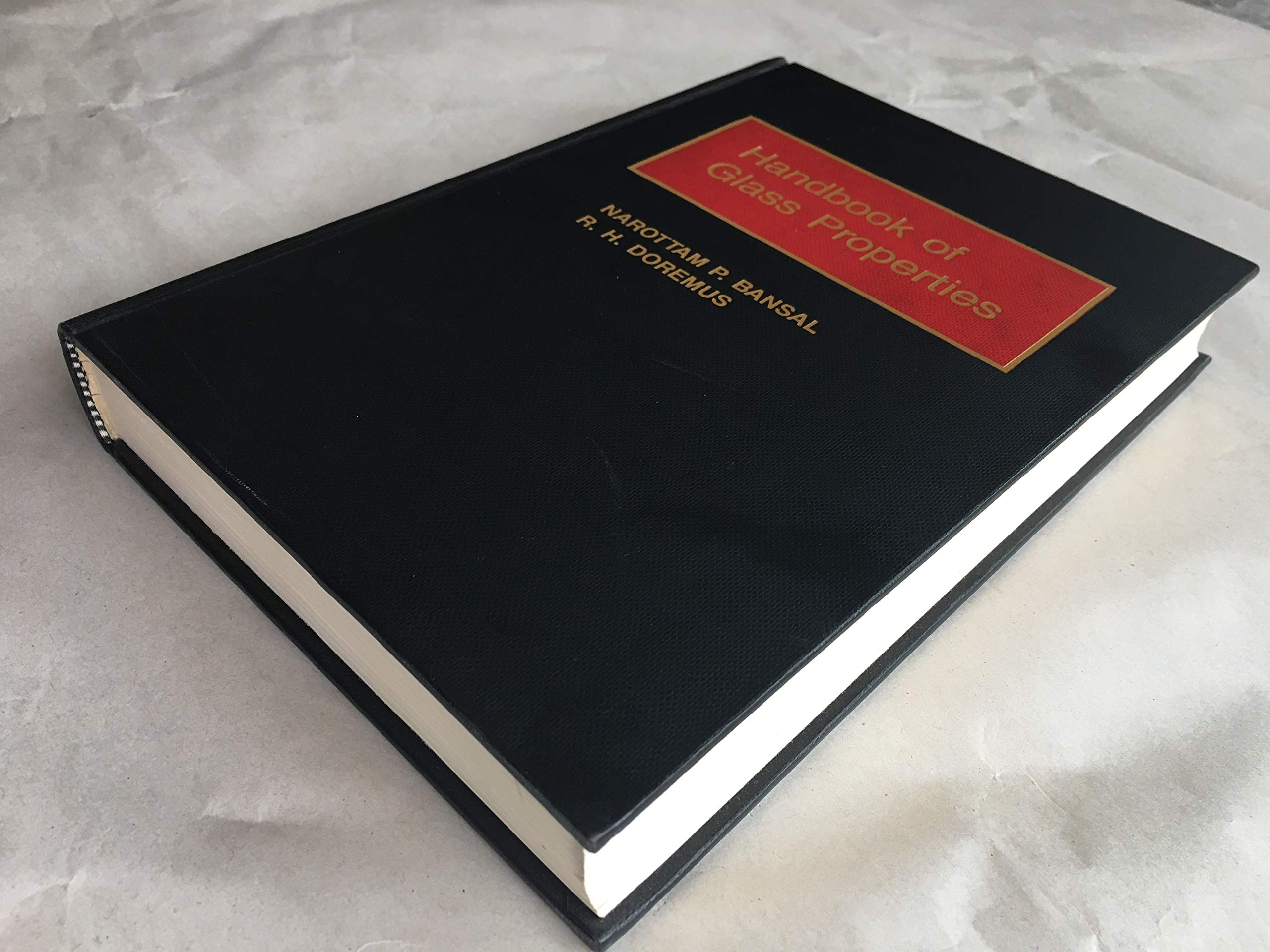 Handbook of Glass Properties (Academic Press Handbook Series),Used
