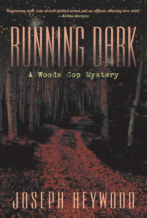 Running Dark: A Woods Cop Mystery,Used