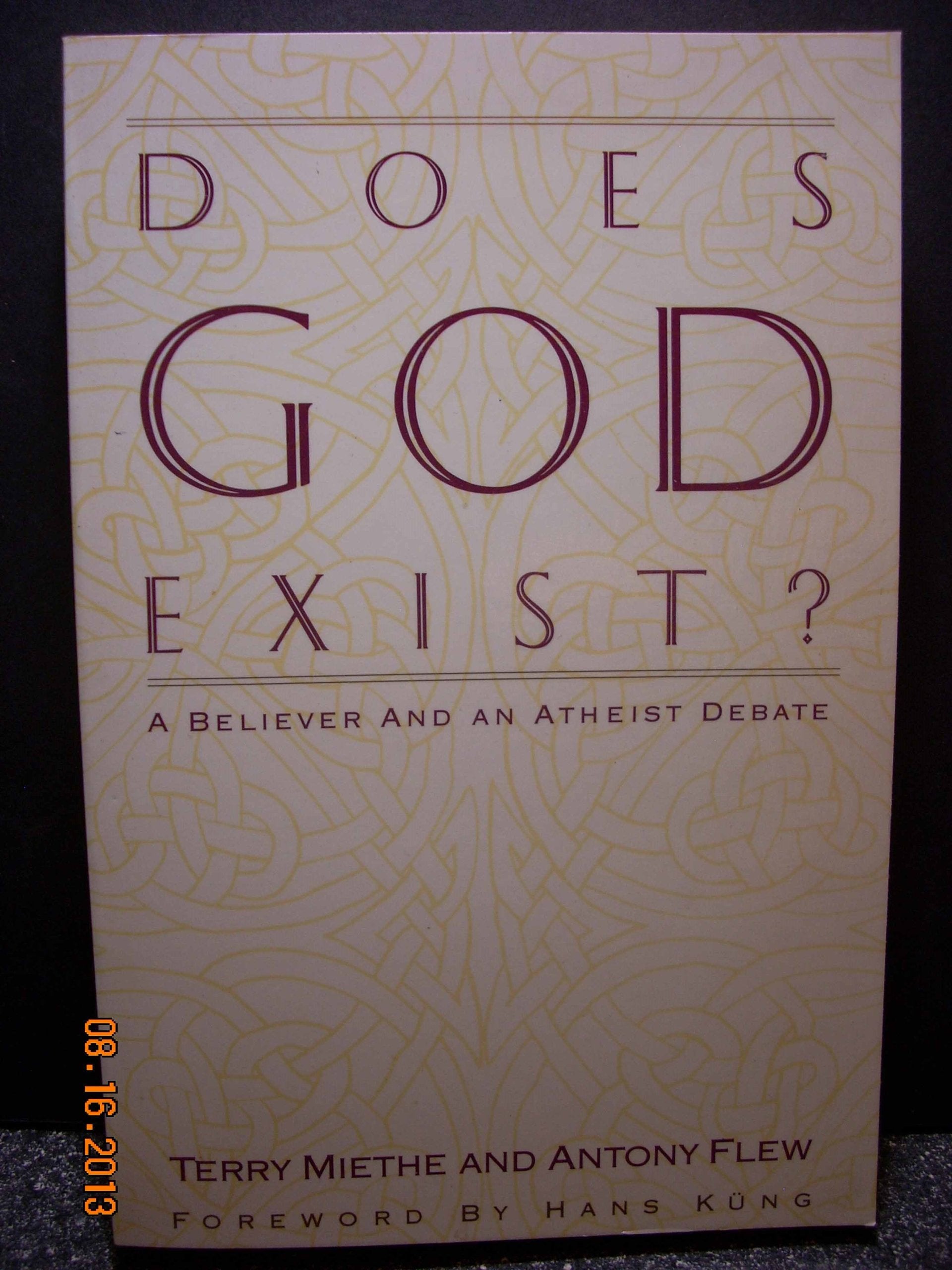Does God Exist?: A Believer And An Atheist Debate,Used