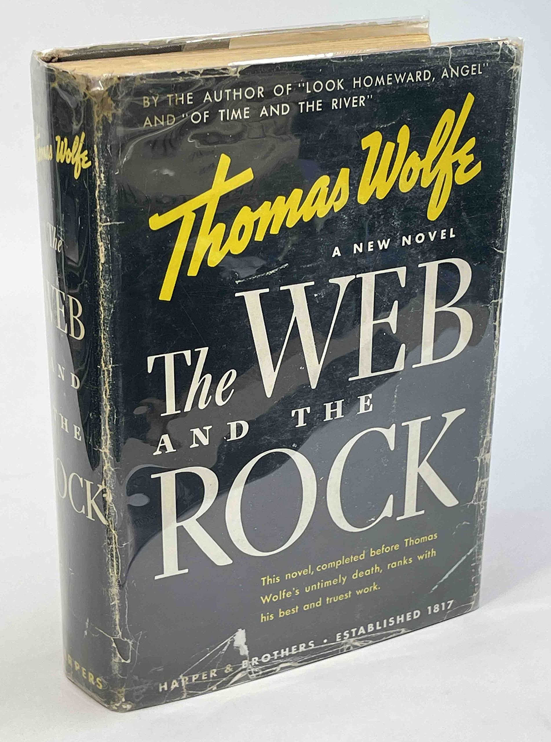 The web and the rock.,Used