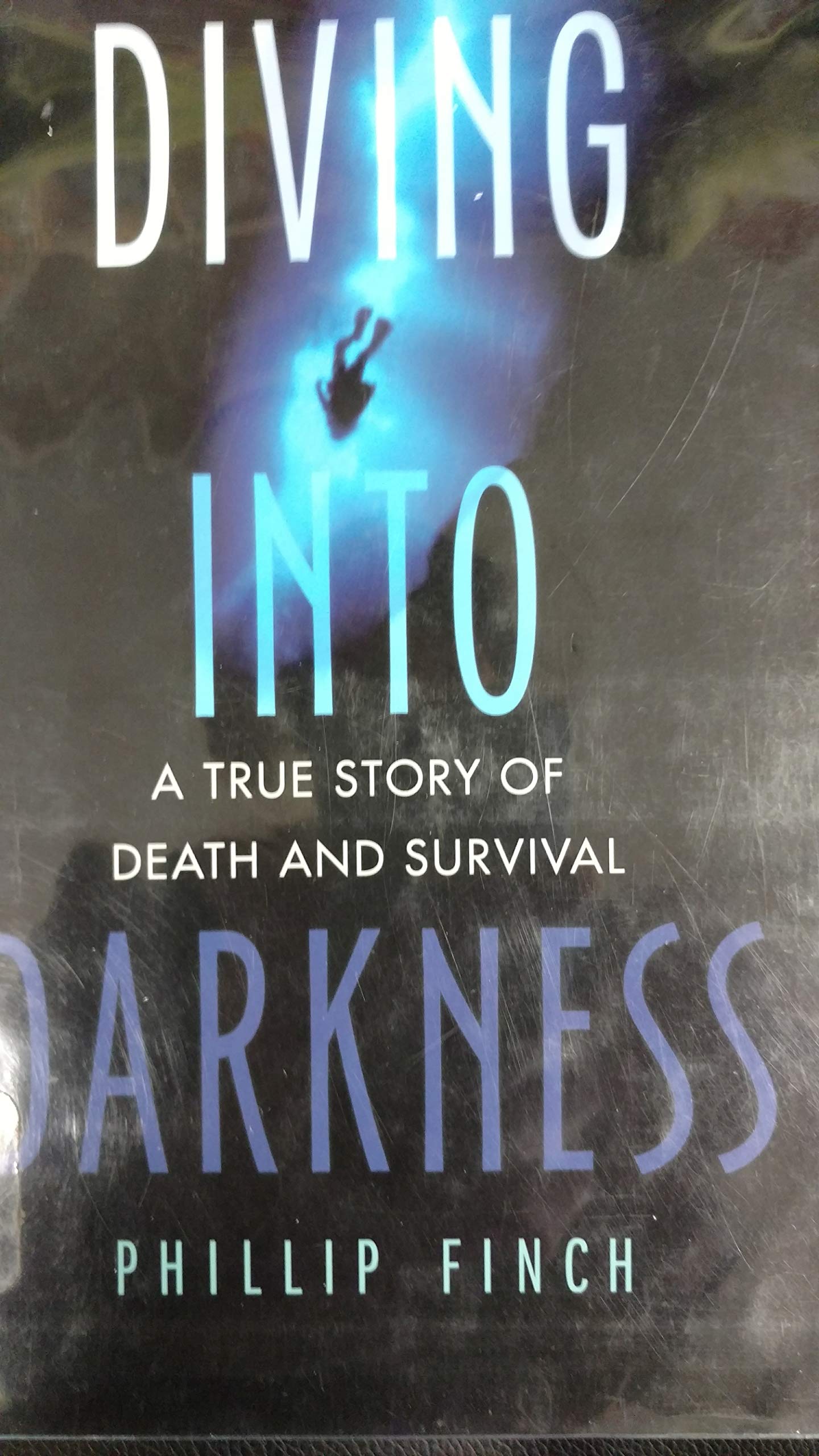Diving into Darkness: A True Story of Death and Survival,Used