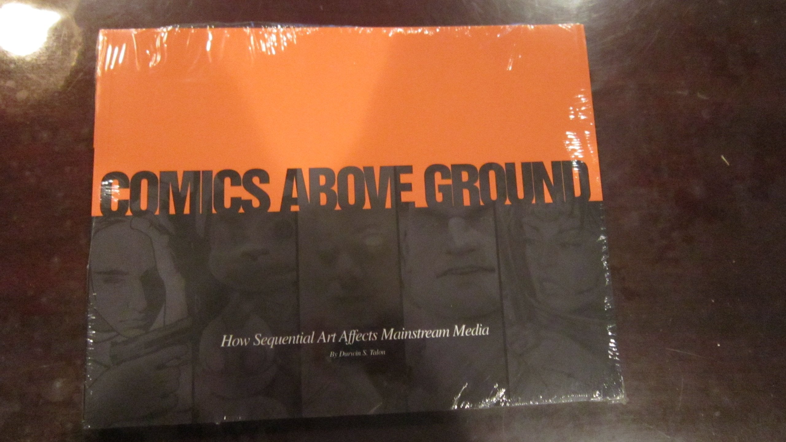 Comics Above Ground: How Sequential Art Affects Mainstream Media,Used