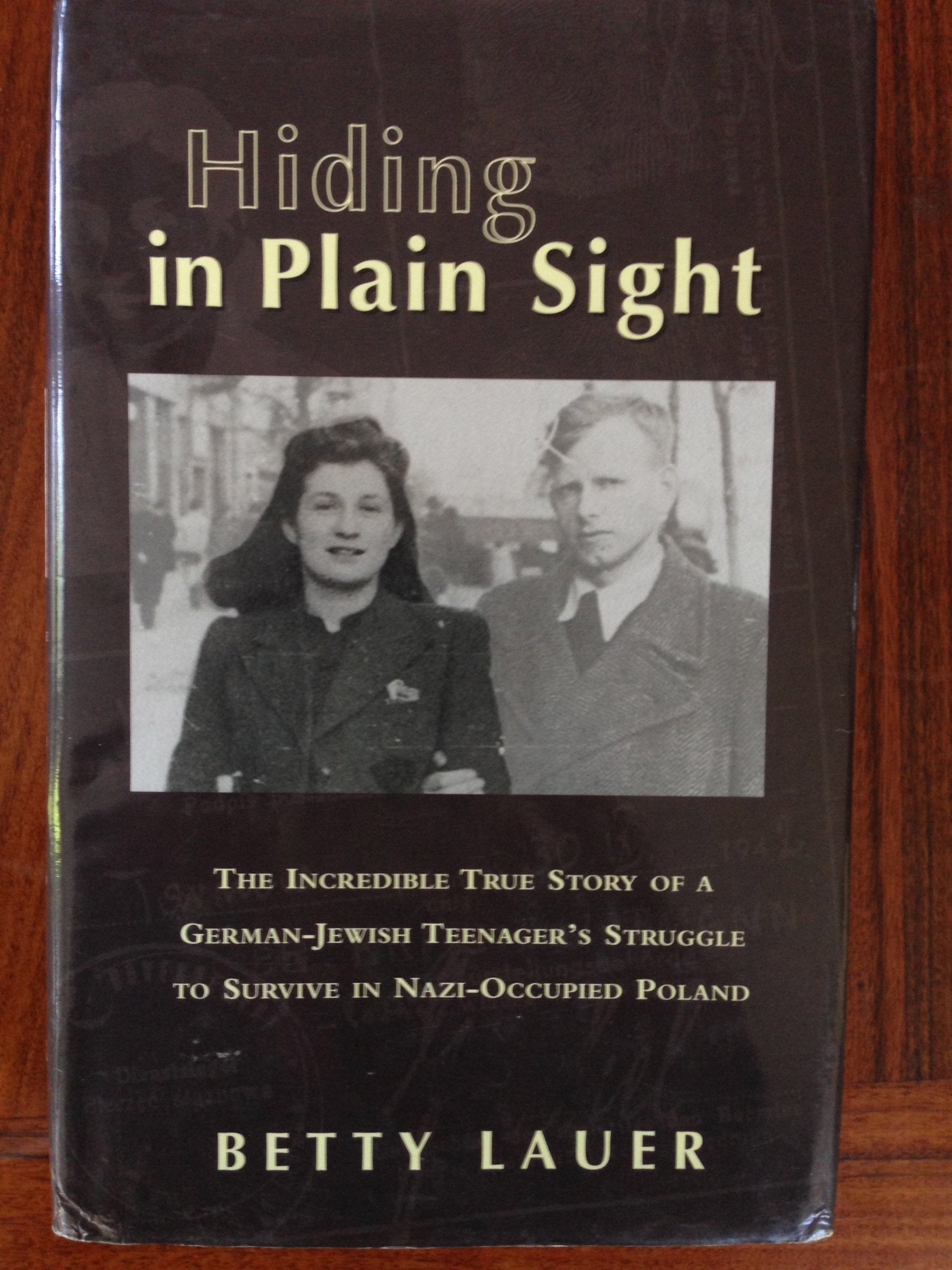 Hiding in Plain Sight: The Incredible True Story of a GermanJewish Teenager's Struggle to Survive in NaziOccupied Poland,Used