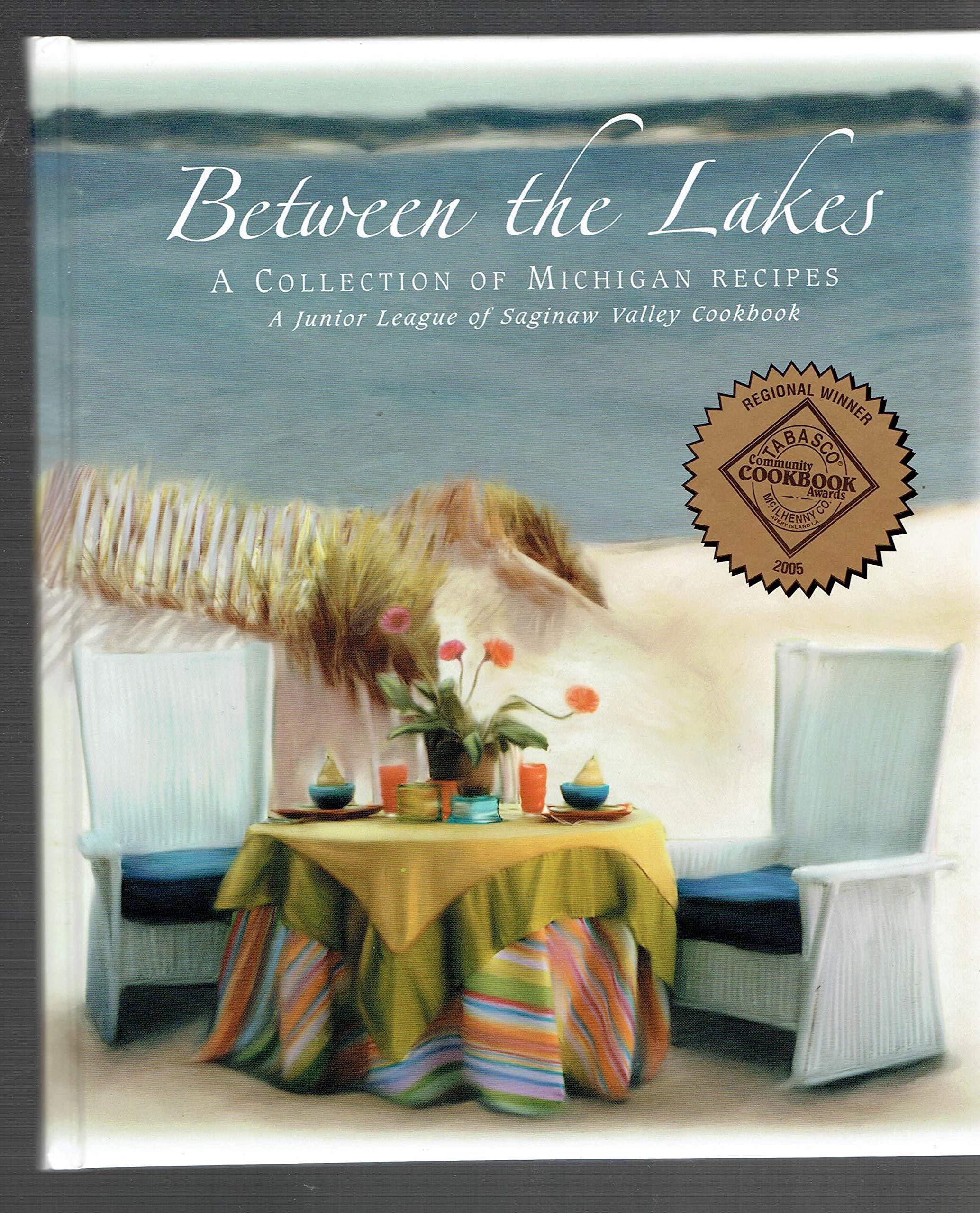 Between the Lakes: A Collection of Michigan Recipes (A Junior League of Saginaw Valley Cookbook),Used