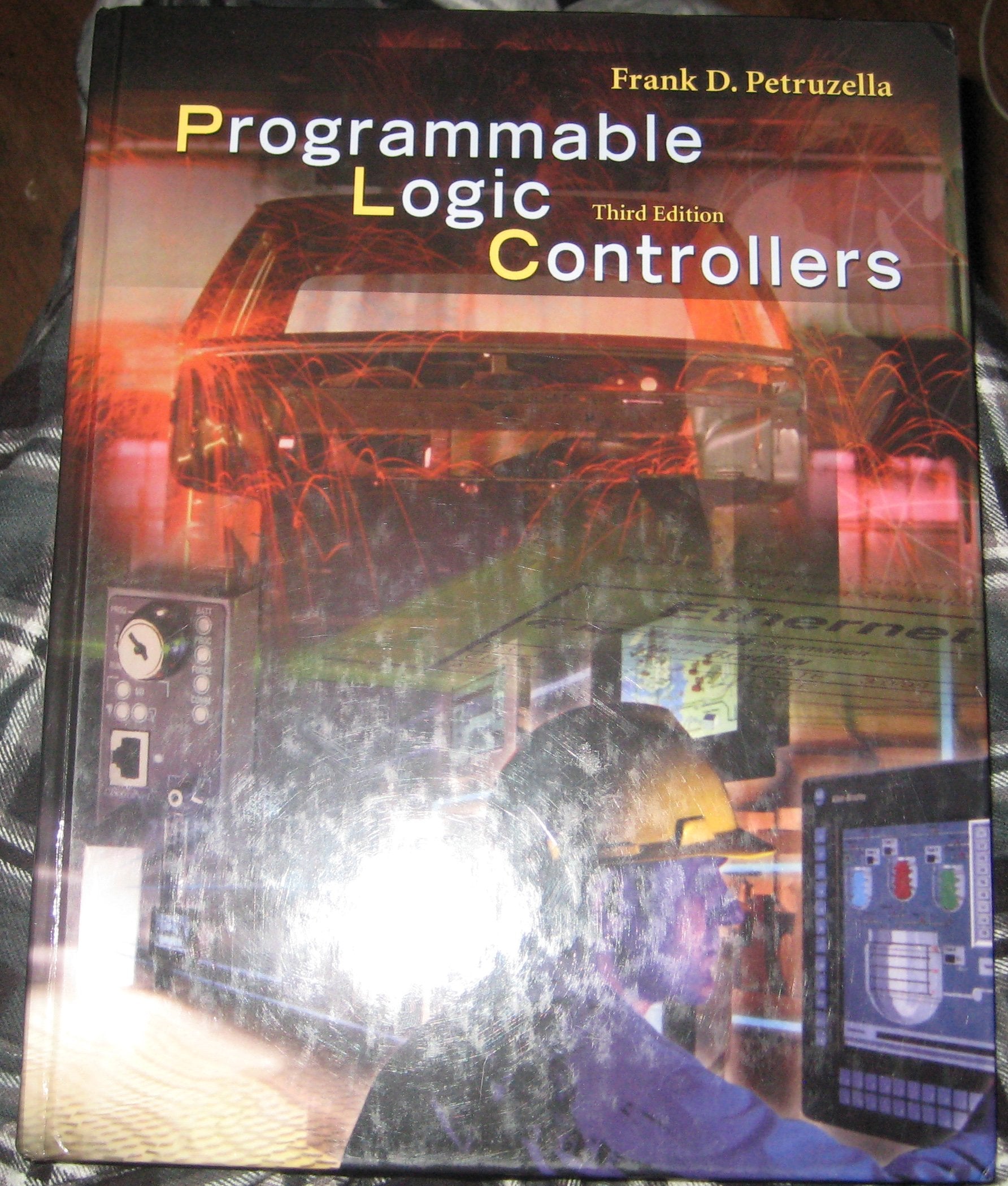 Programmable Logic Controllers, Third Edition,Used